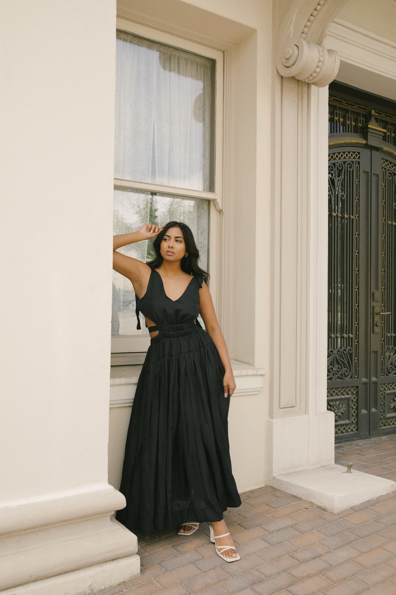 black cut out maxi dress with an open back