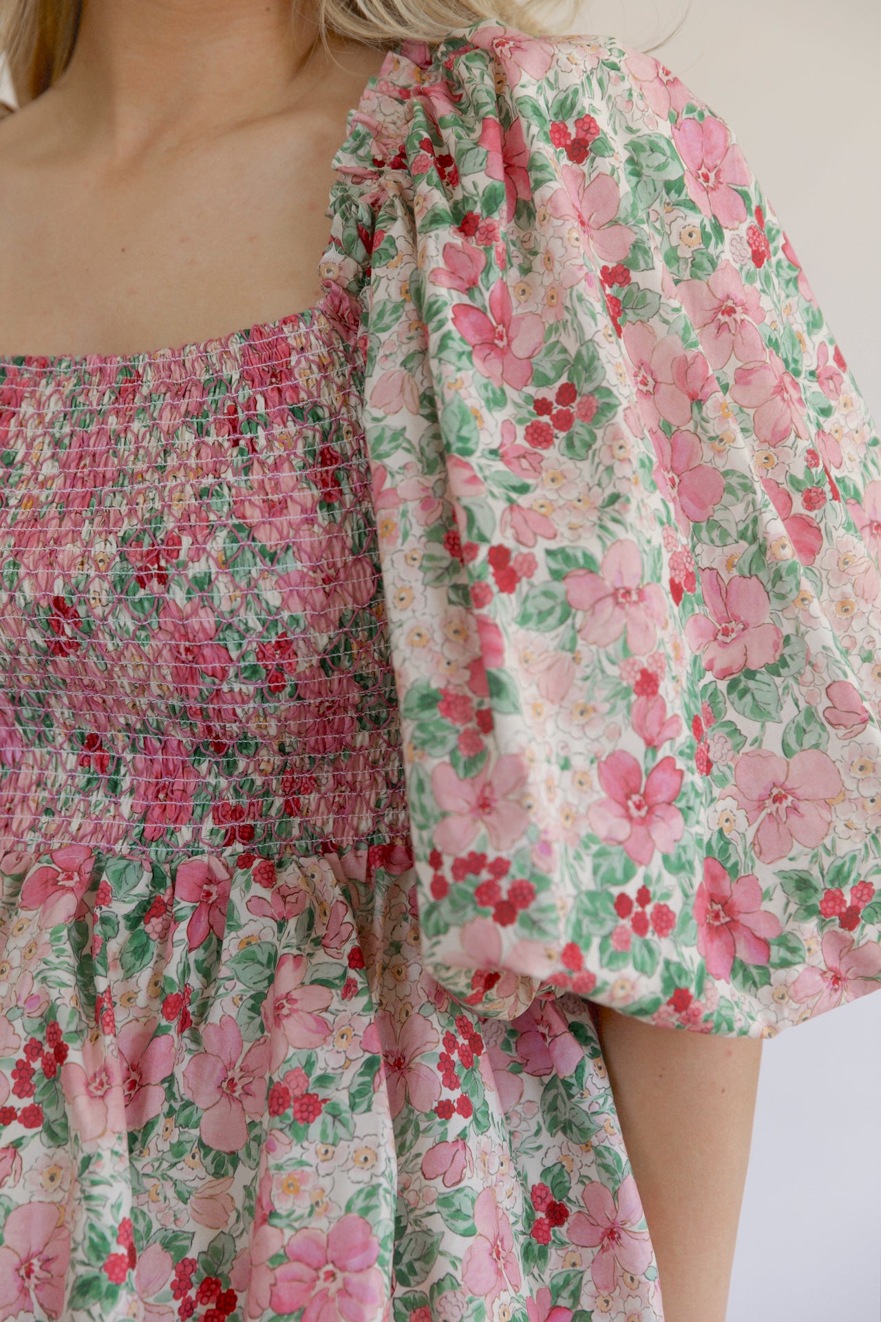 pink and green floral puff sleeve tiered mini dress that is a statement dress