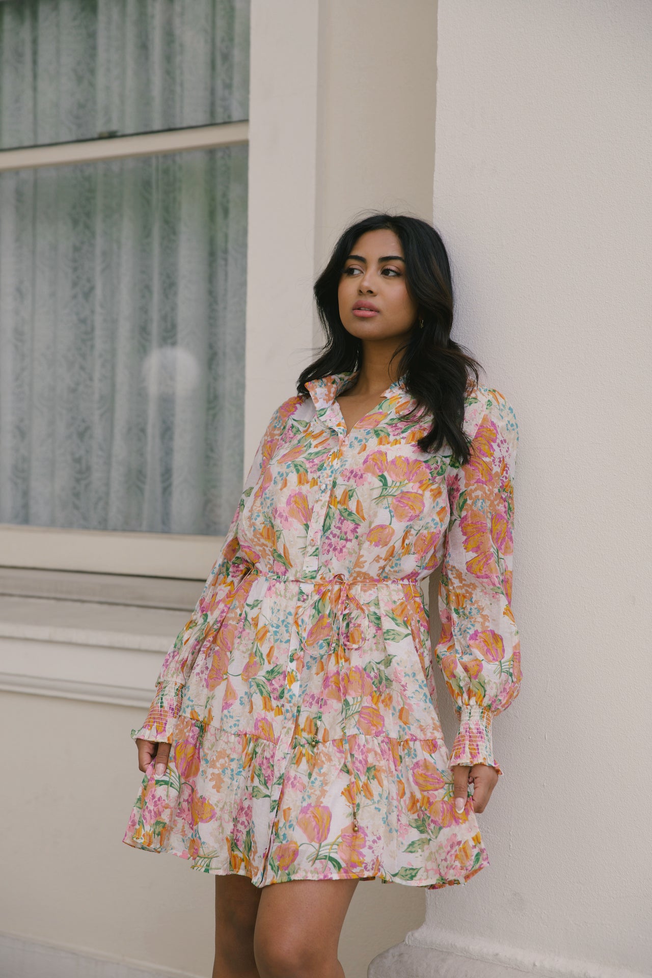 beige with orange floral mini dress with long sleeves and belted
