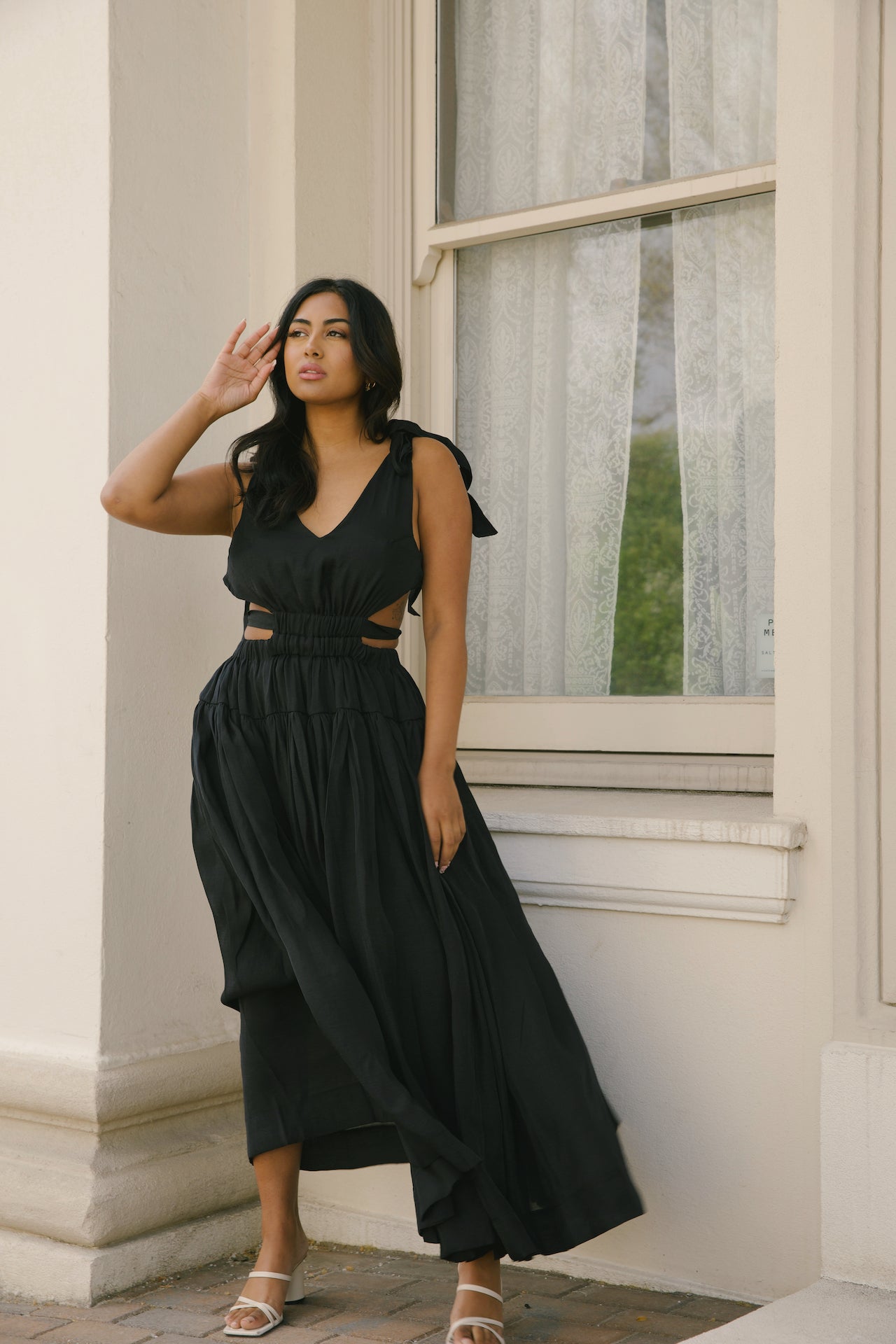 black cut out maxi dress with an open back