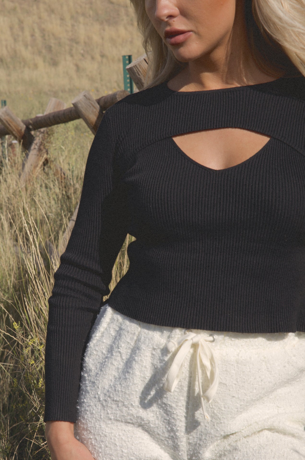 black cut out sweater top