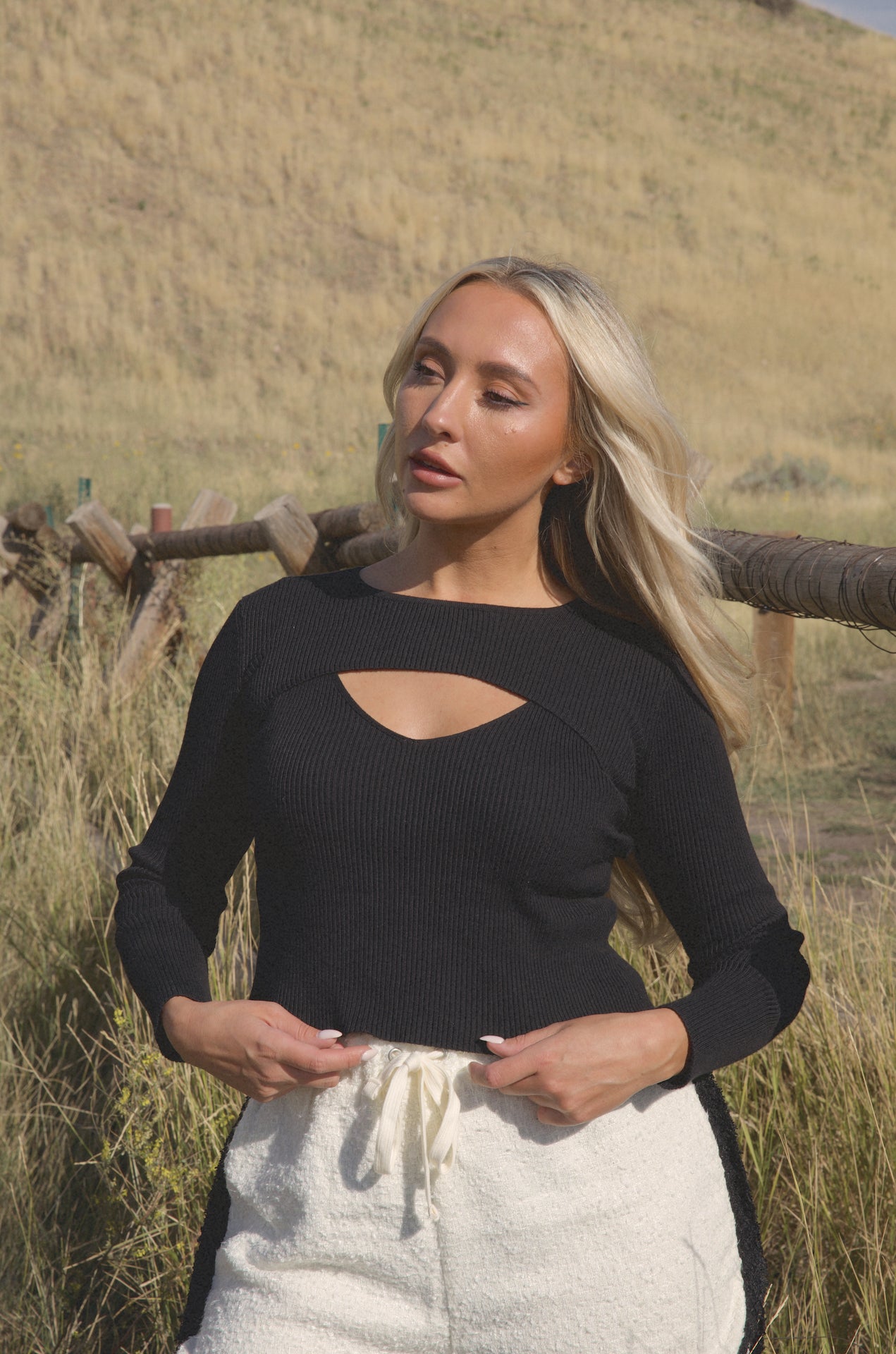 black cut out sweater top