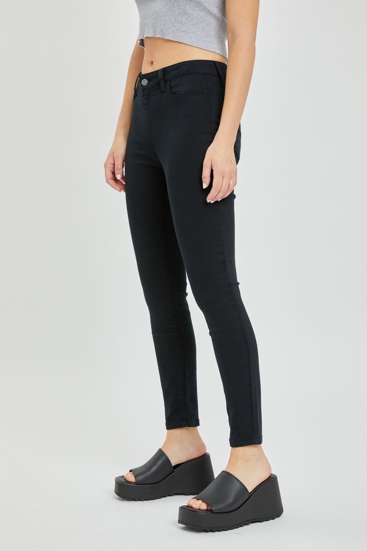 black mid rise cropped skinny jeans