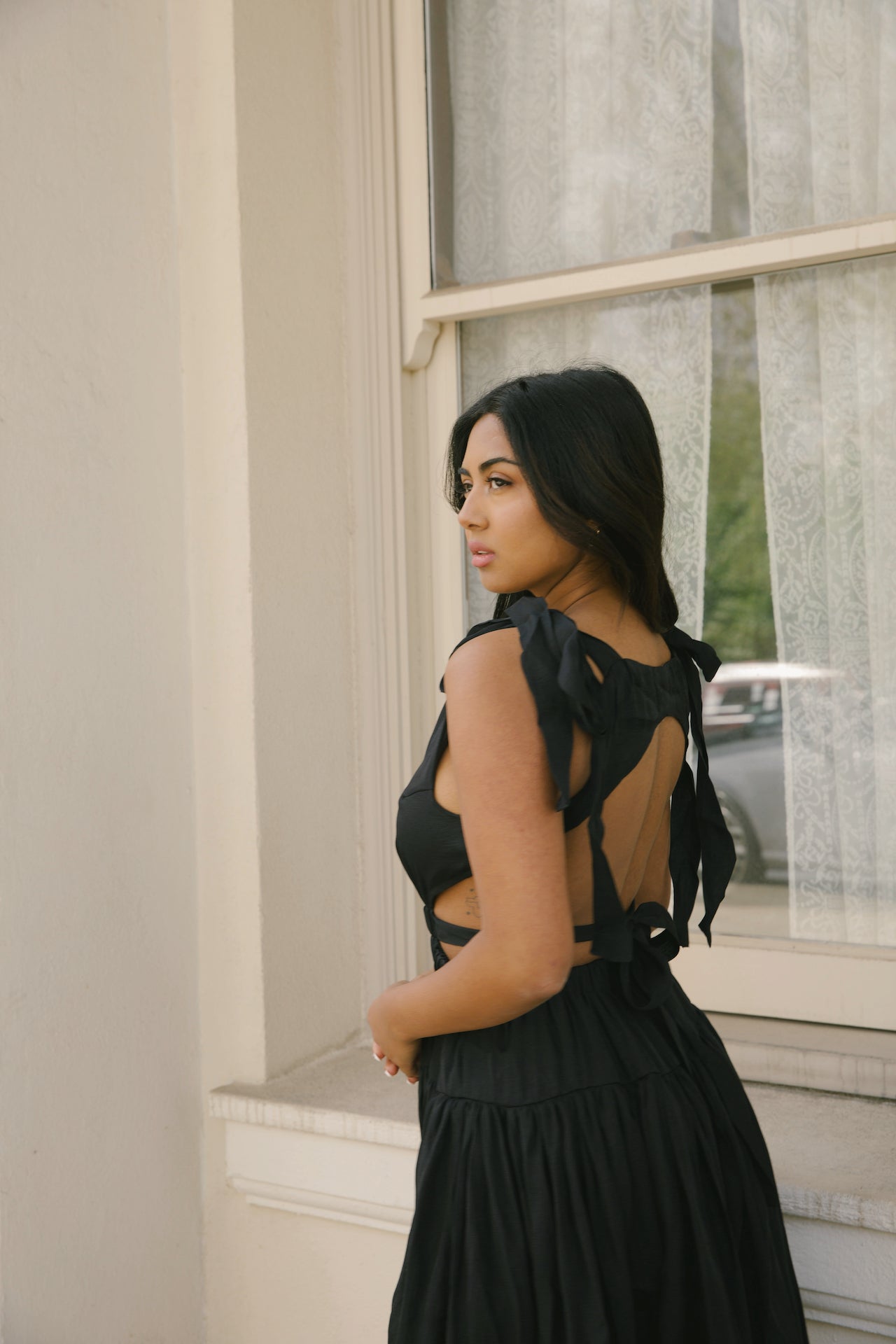 black cut out maxi dress with an open back