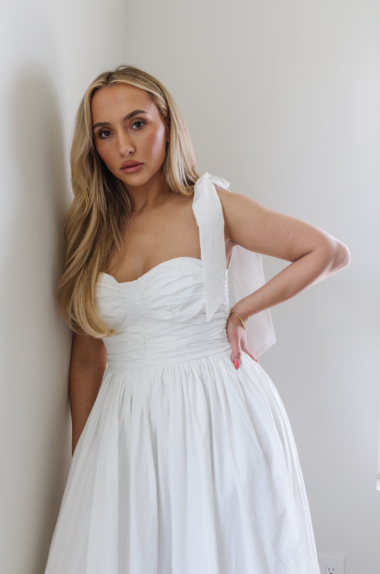 white midi poplin dress with bow on shoulders