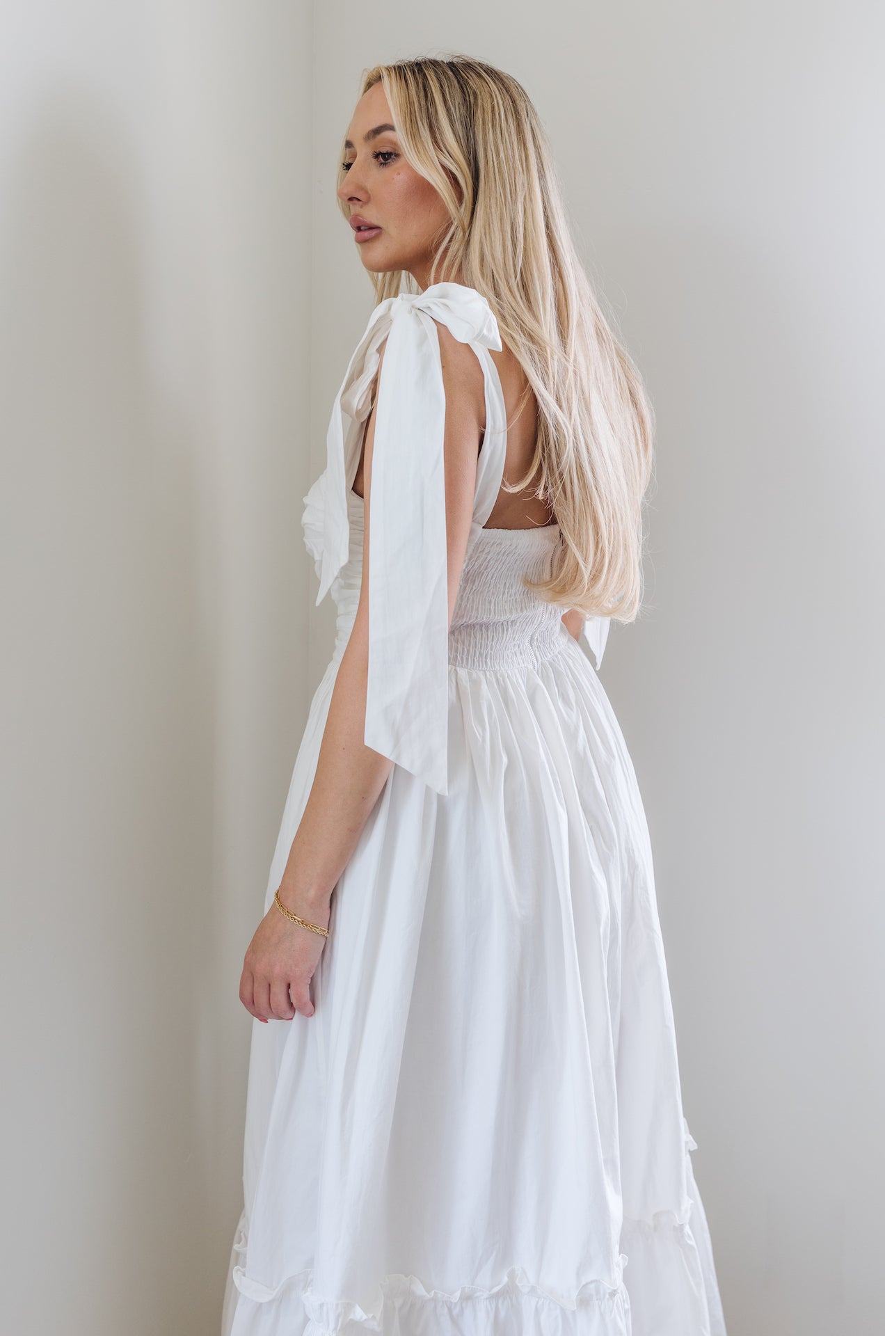 white midi poplin dress with bow on shoulders