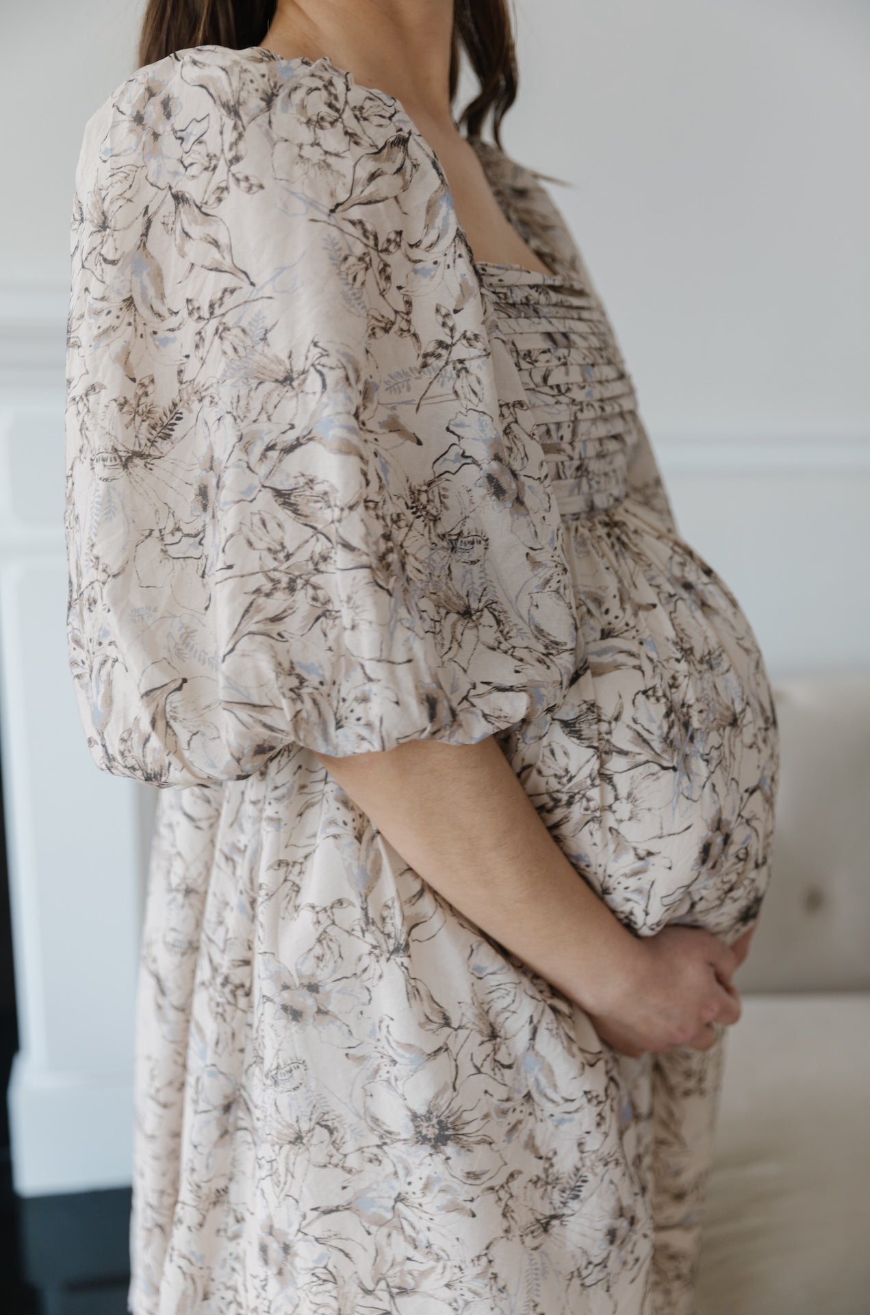 beige floral puff sleeve midi dress with a back bow tie