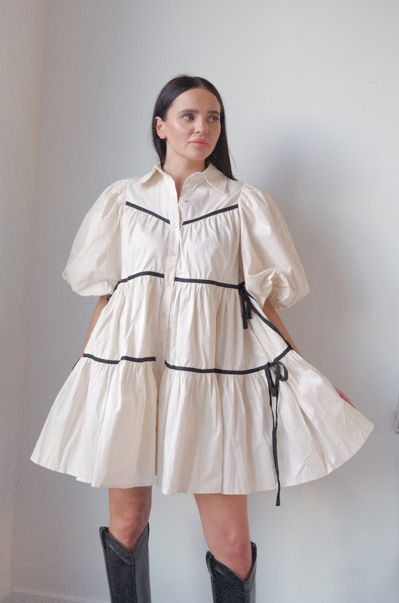 cream collared puff sleeve babydoll dress with side bow tie detail