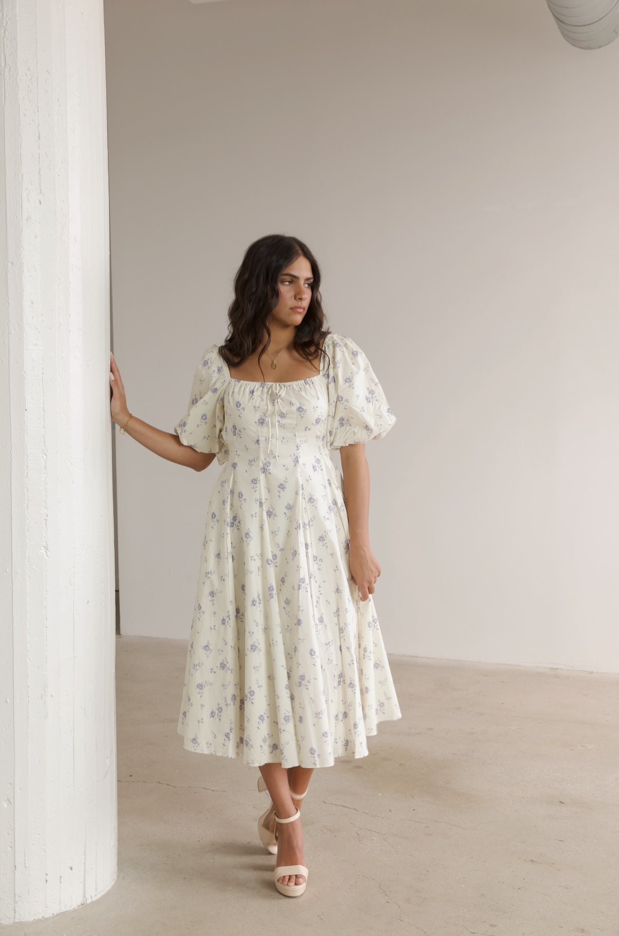 cream and blue floral midi dress with puff sleeves and square neckline