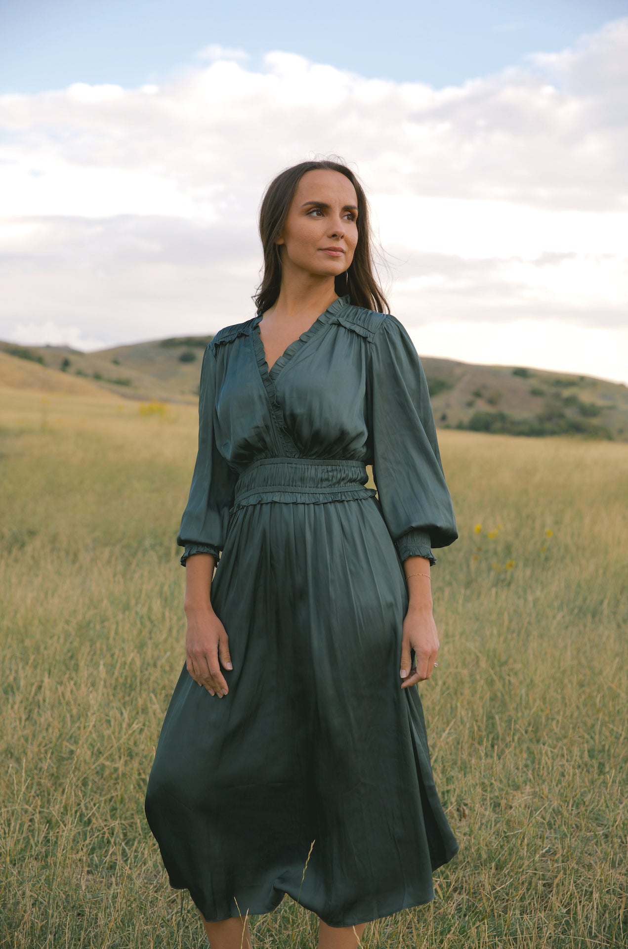 silky green surplice bodice midi dress with long sleeves