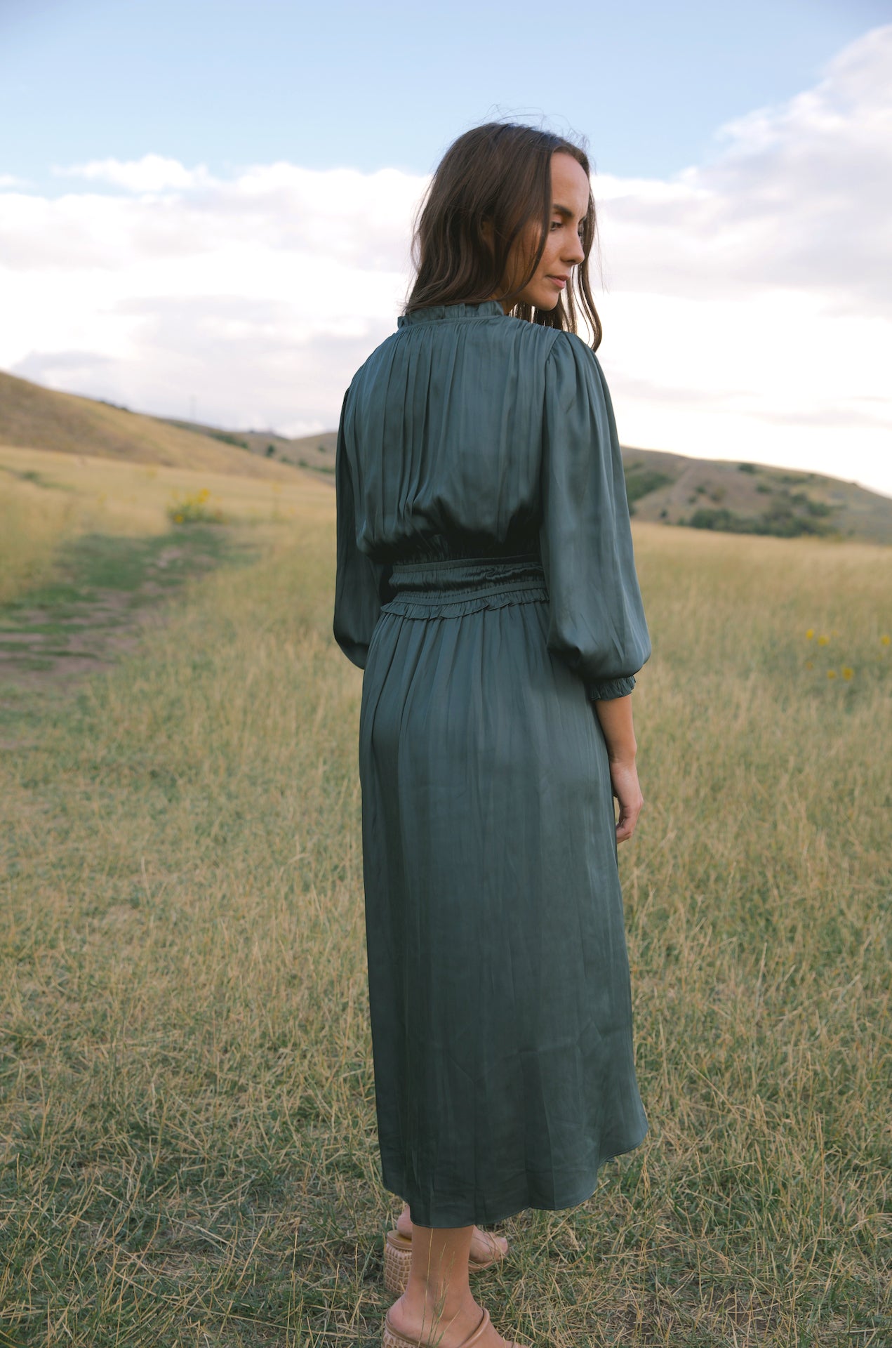 silky green surplice bodice midi dress with long sleeves