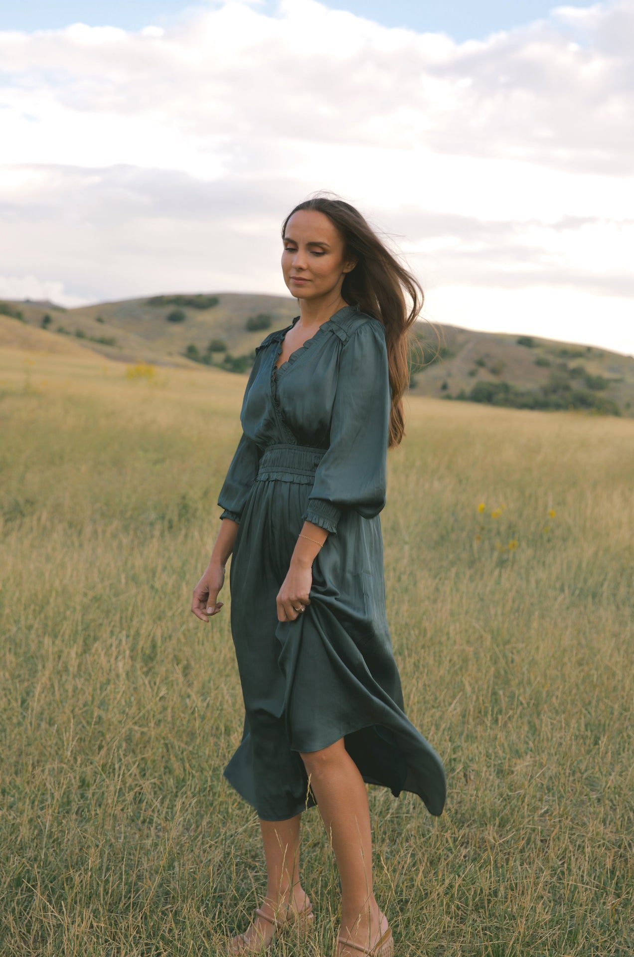 silky green surplice bodice midi dress with long sleeves