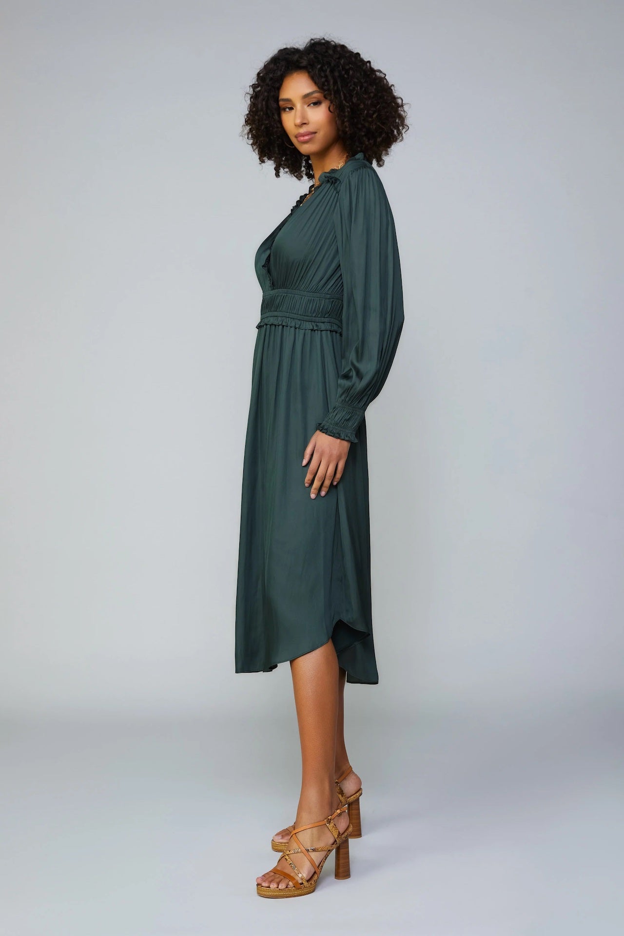 silky green surplice bodice midi dress with long sleeves