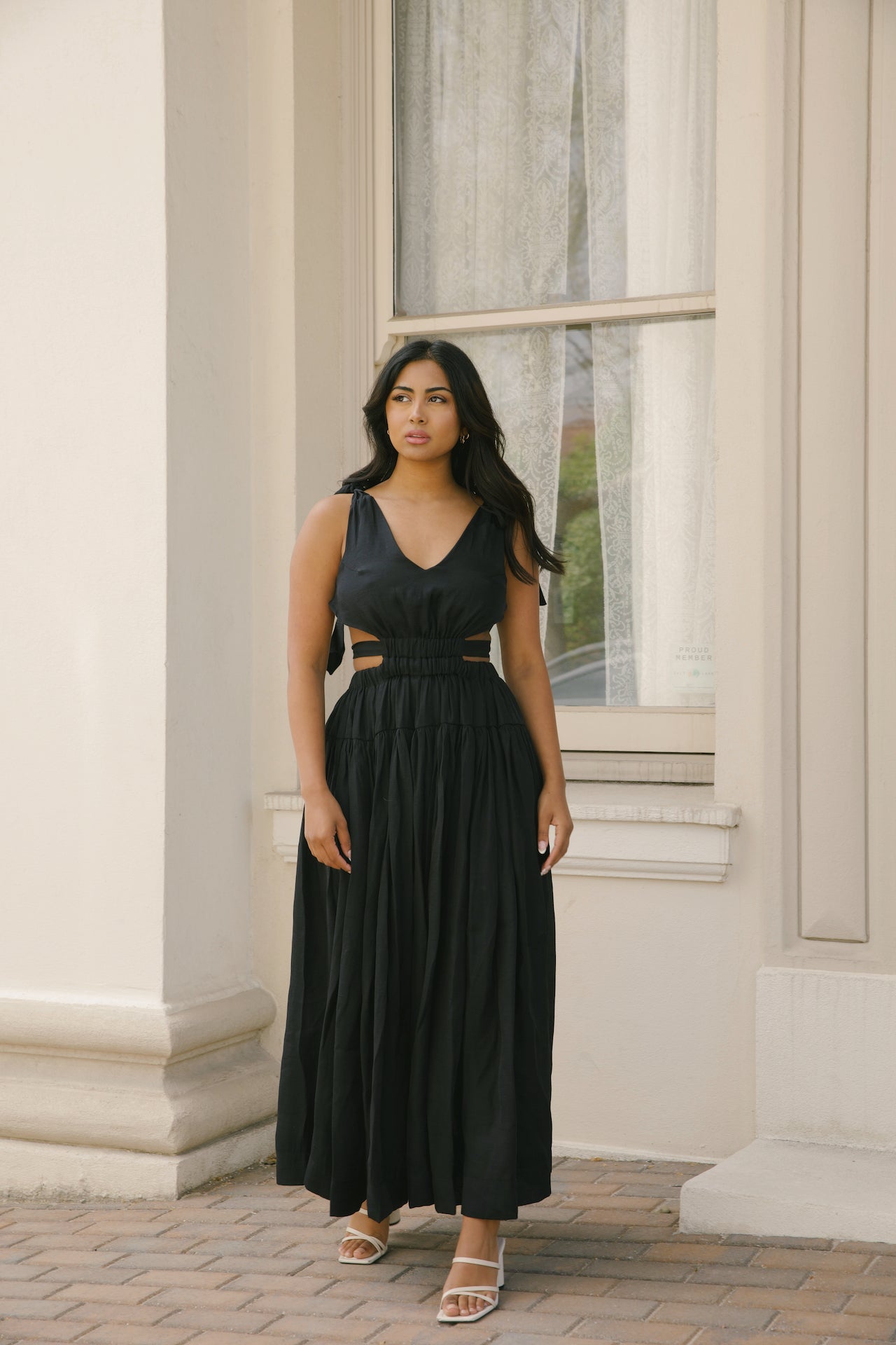 black cut out maxi dress with an open back