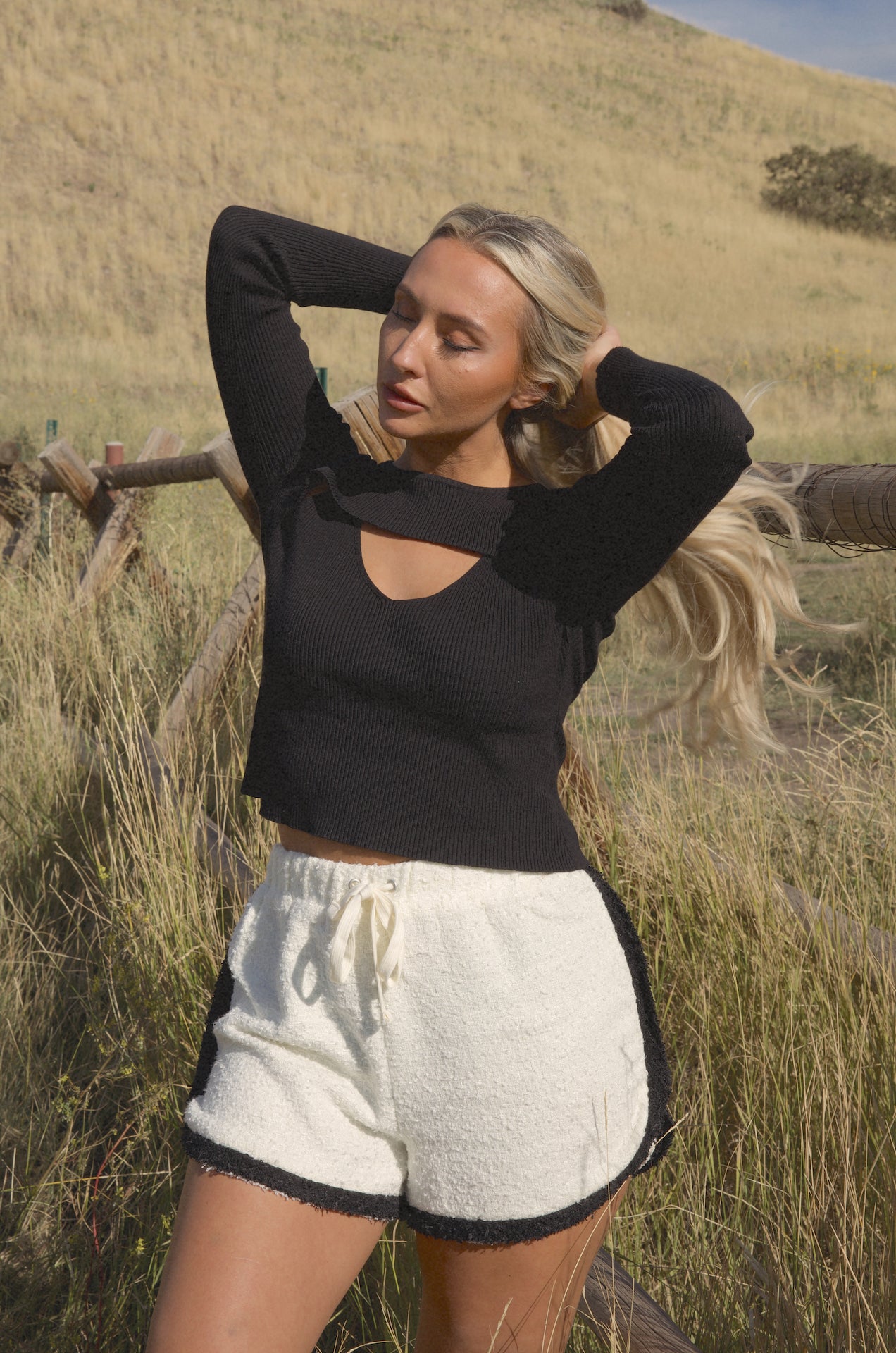 black cut out sweater top