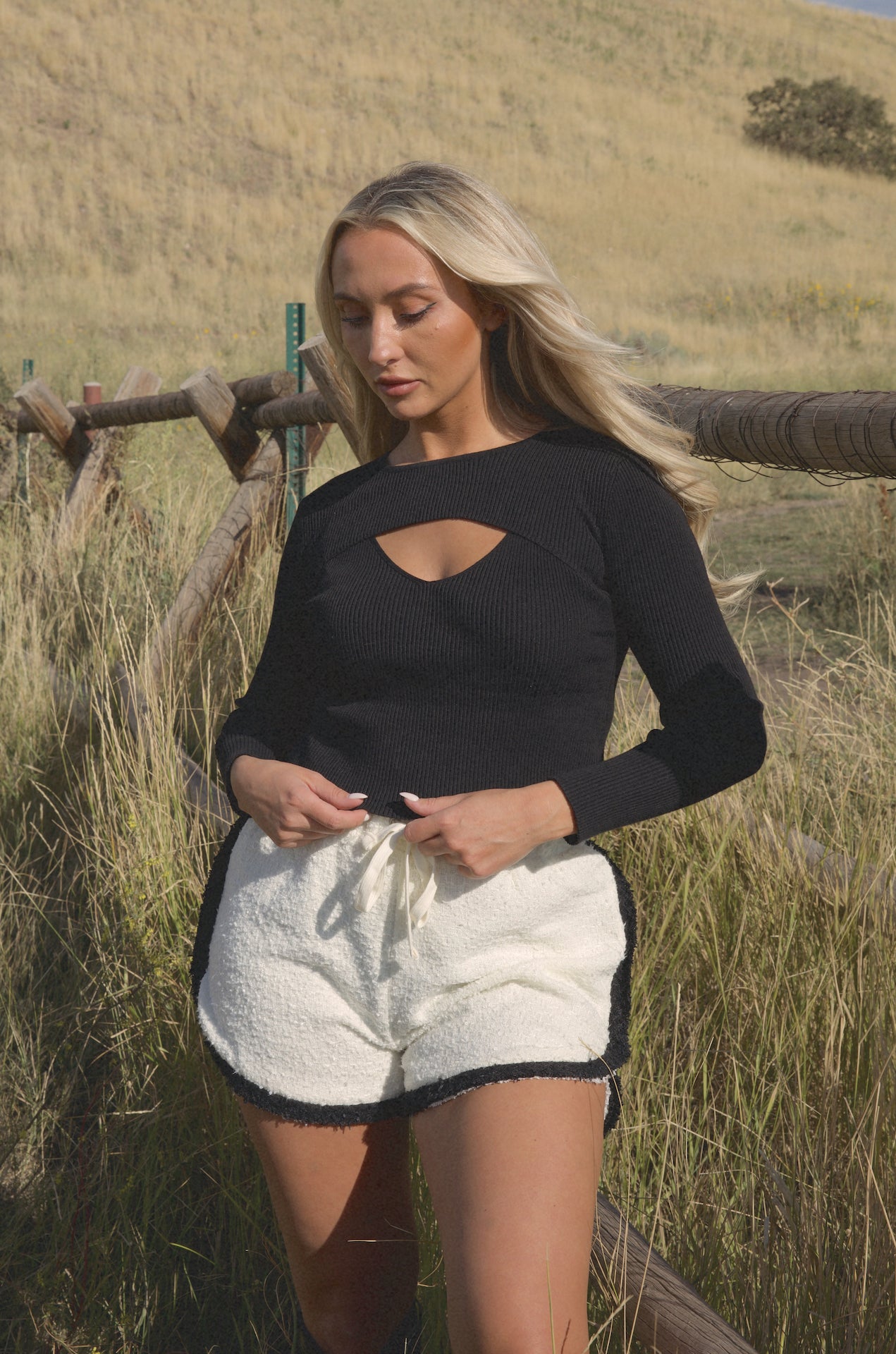 black cut out sweater top