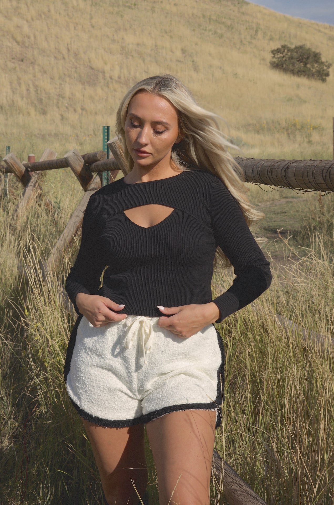 black cut out sweater top