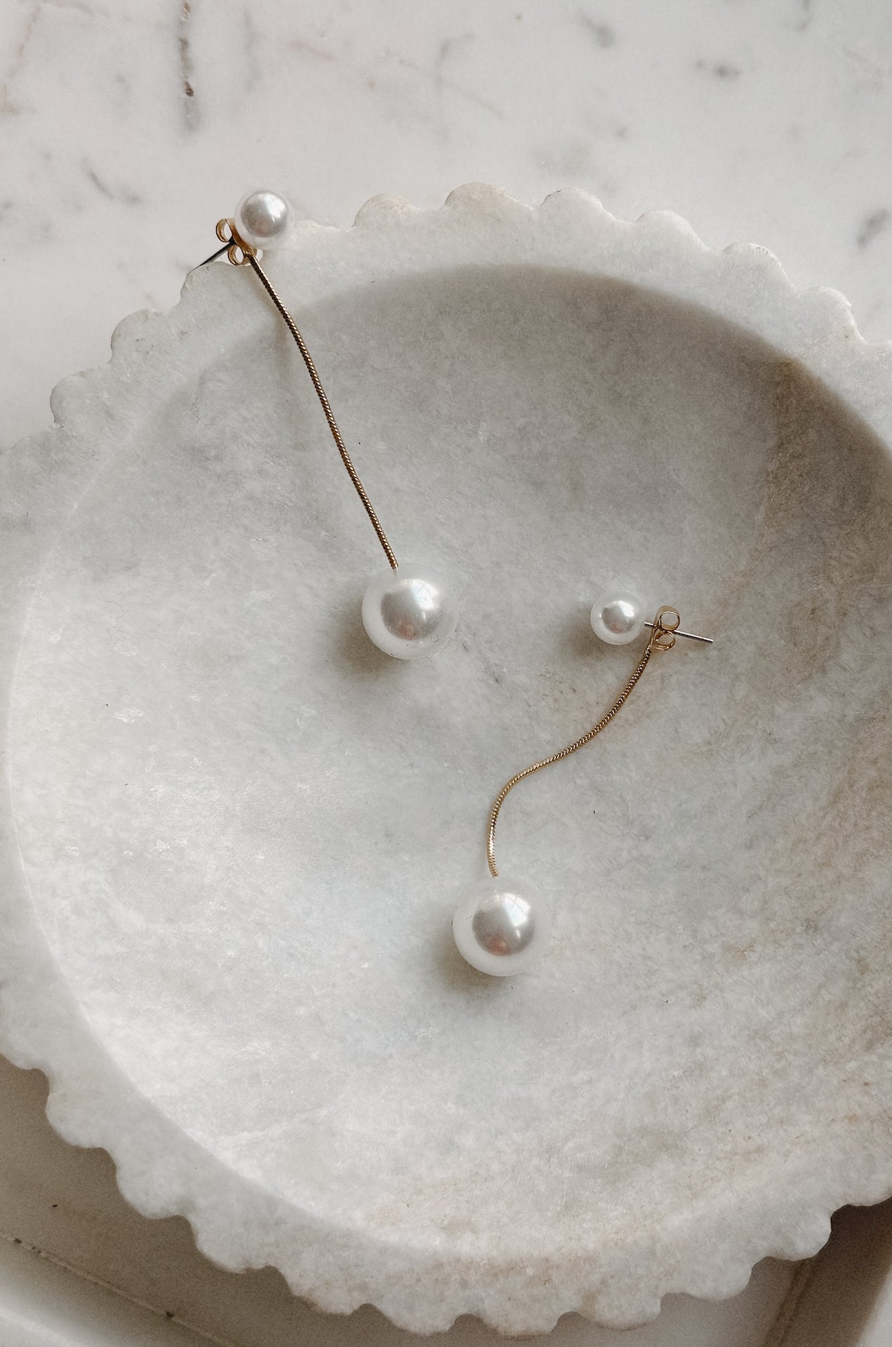 dangling pearl earrings