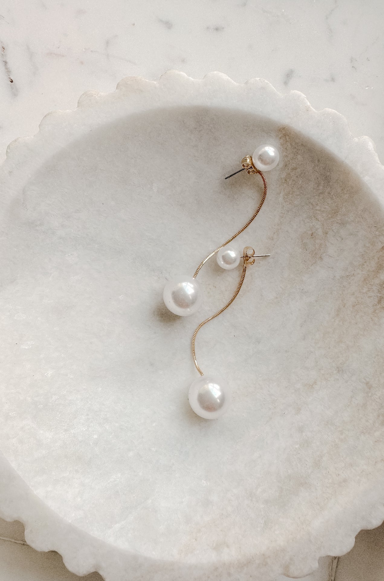 dangling pearl earrings