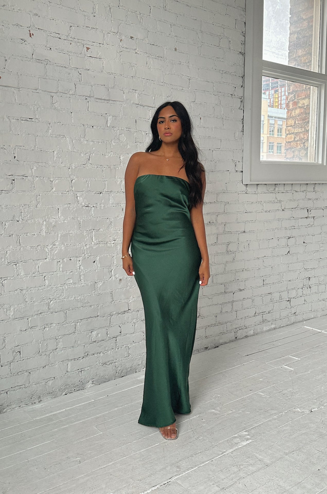 emerald green cowl back strapless maxi dress with a back bow tie