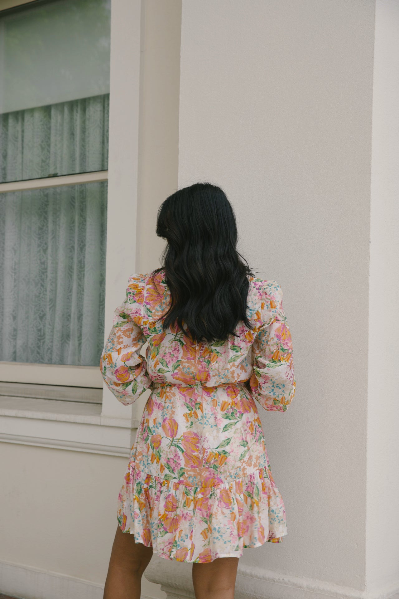 beige with orange floral mini dress with long sleeves and belted