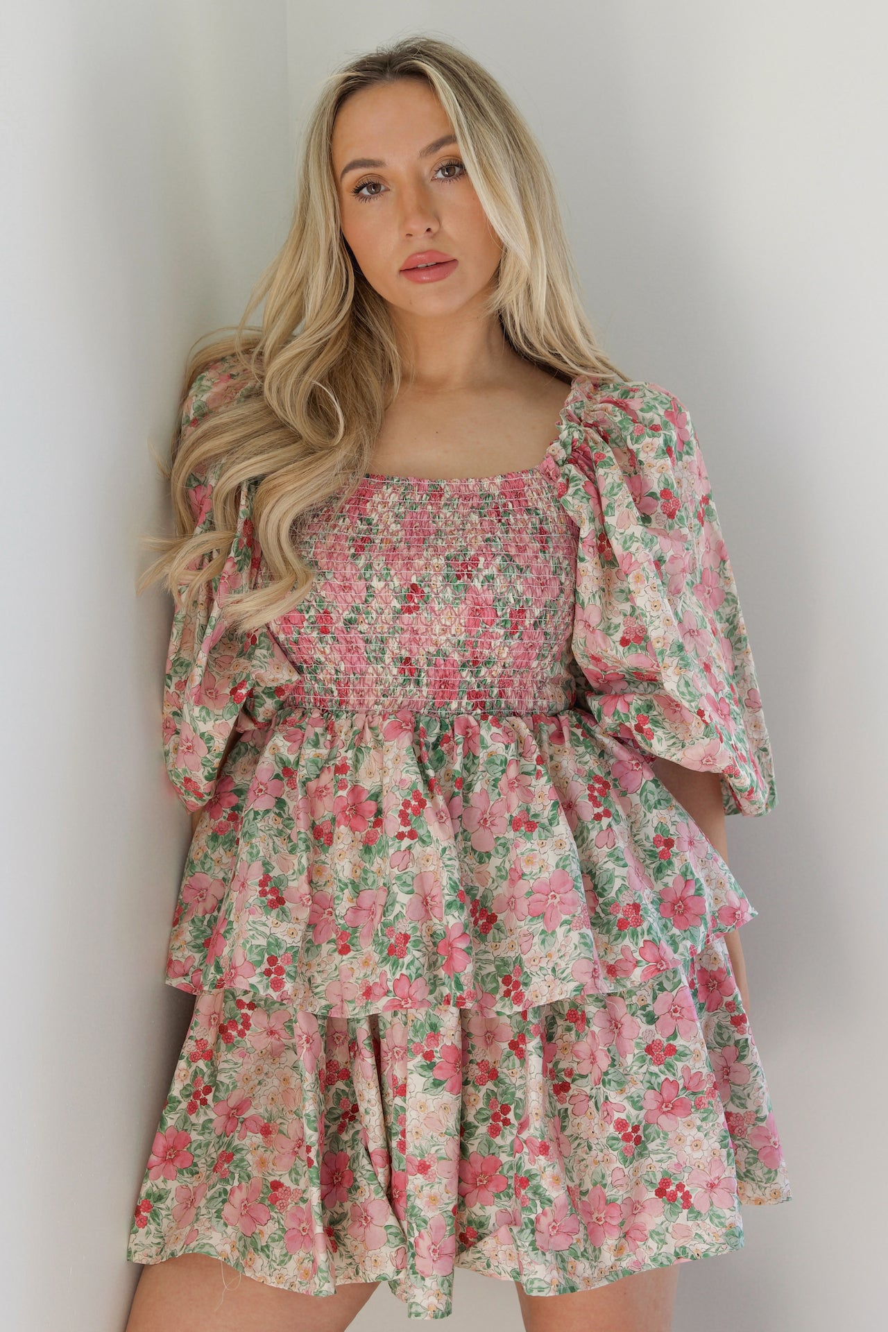 pink and green floral puff sleeve tiered mini dress that is a statement dress