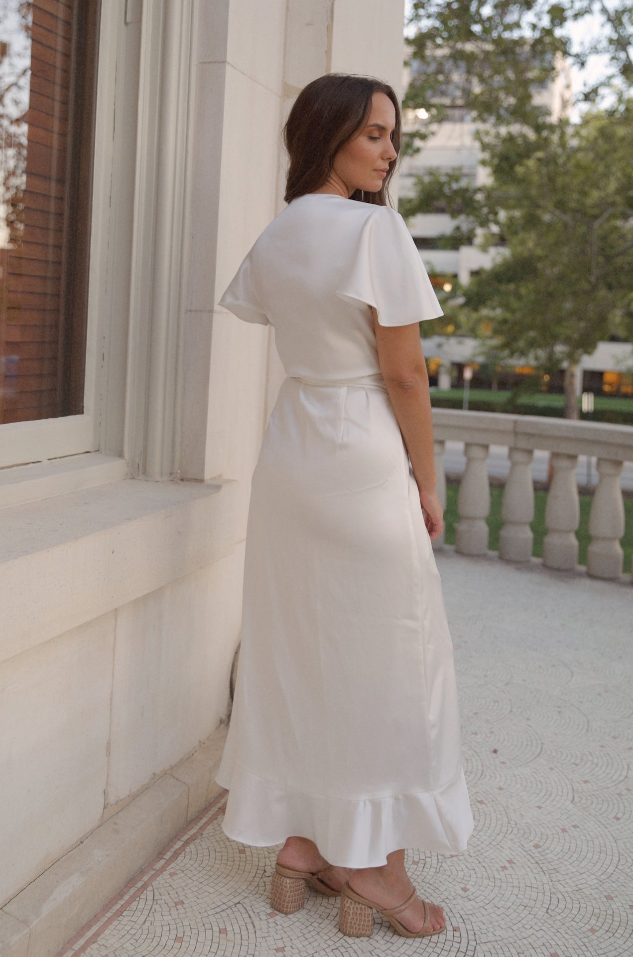 white satin midi dress with flutter sleeves