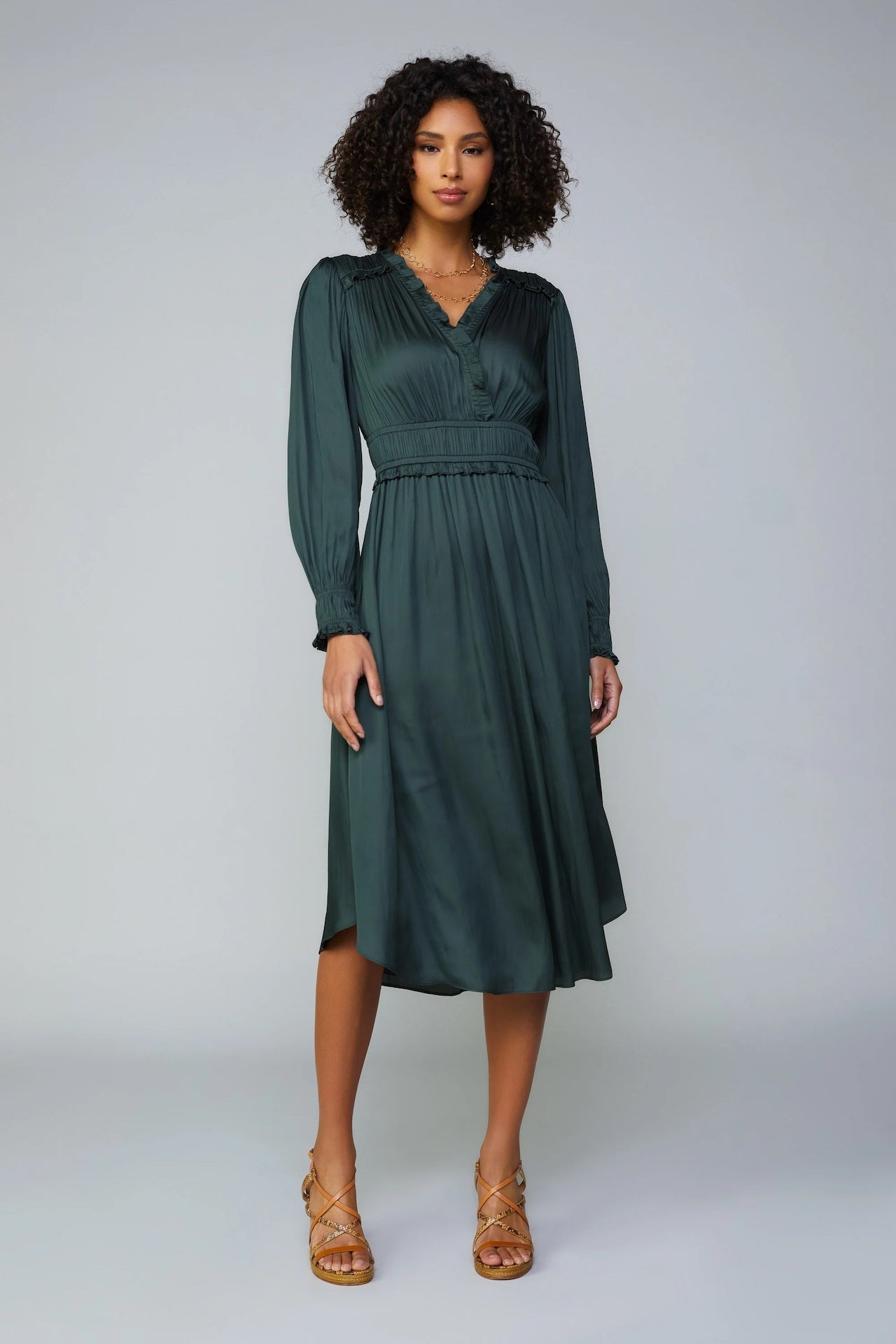 silky green surplice bodice midi dress with long sleeves