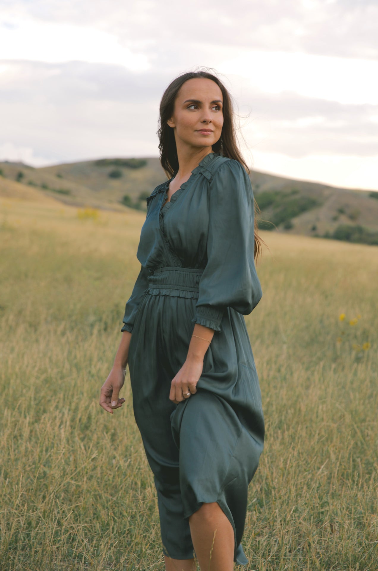 silky green surplice bodice midi dress with long sleeves