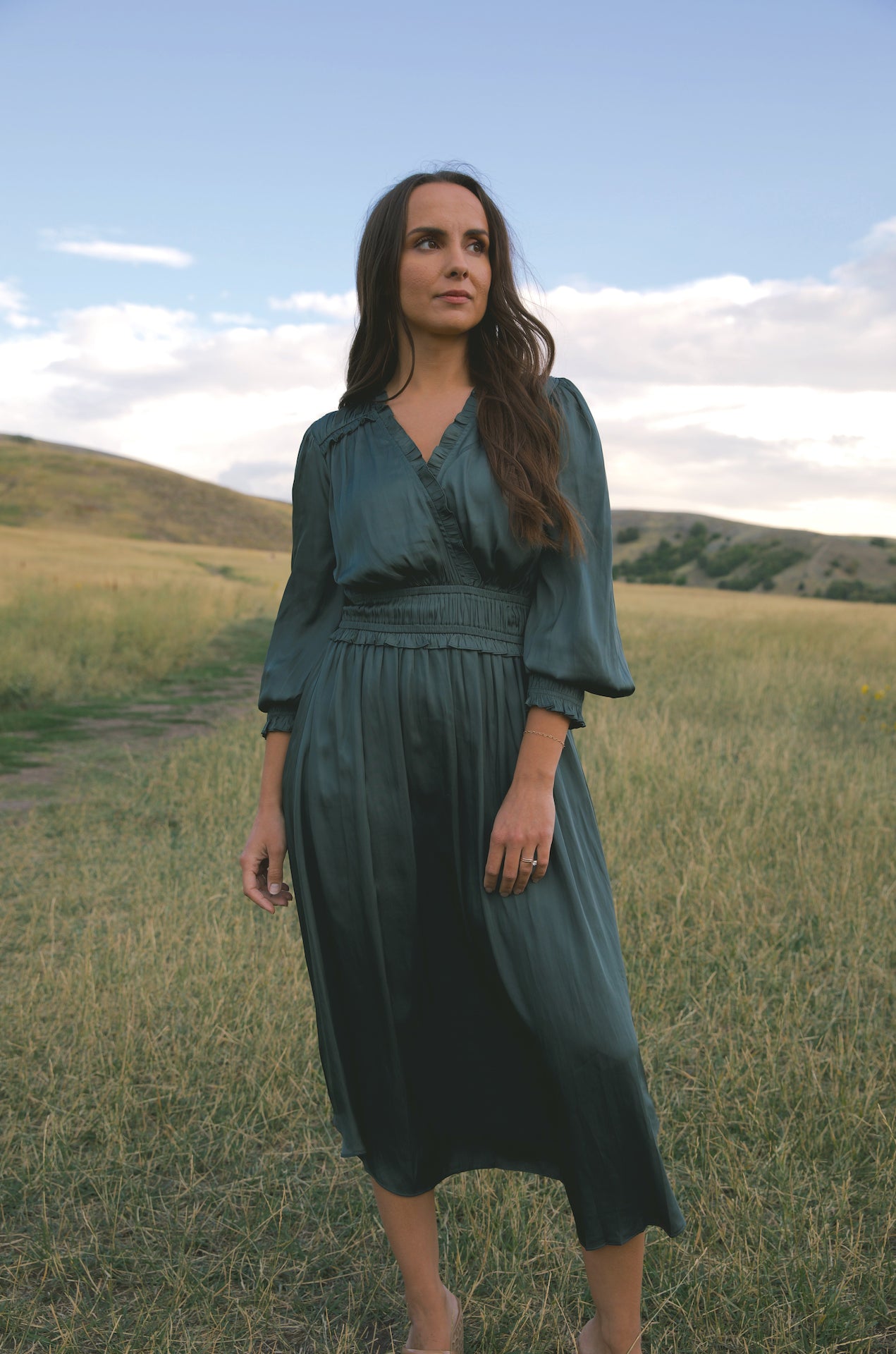 silky green surplice bodice midi dress with long sleeves