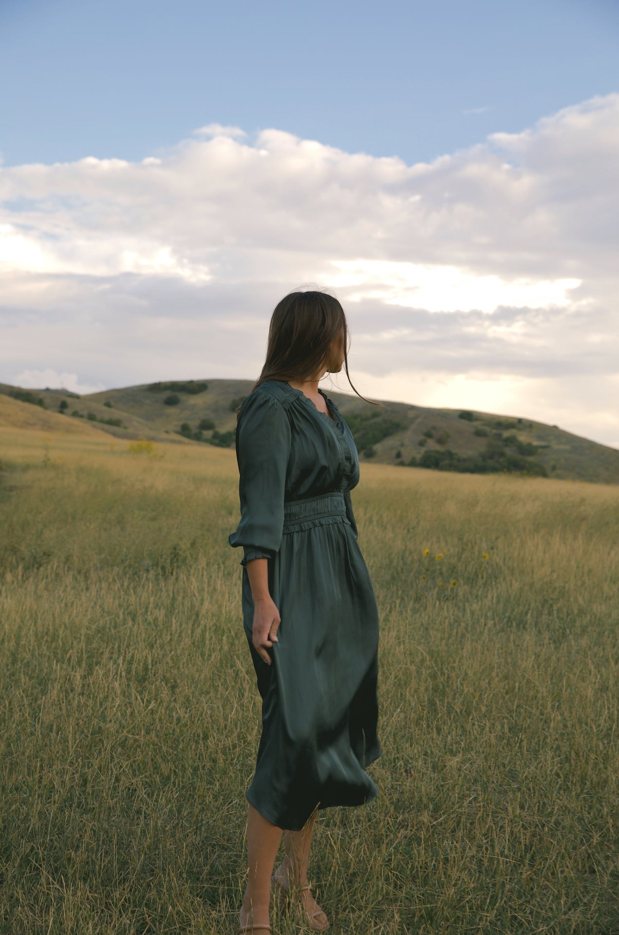 silky green surplice bodice midi dress with long sleeves