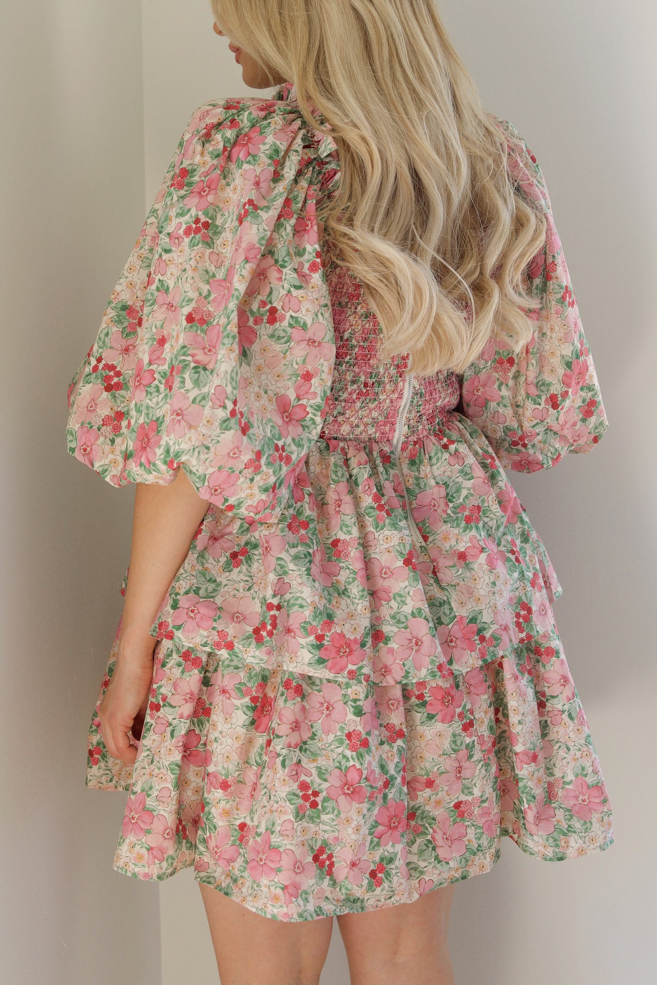 pink and green floral puff sleeve tiered mini dress that is a statement dress