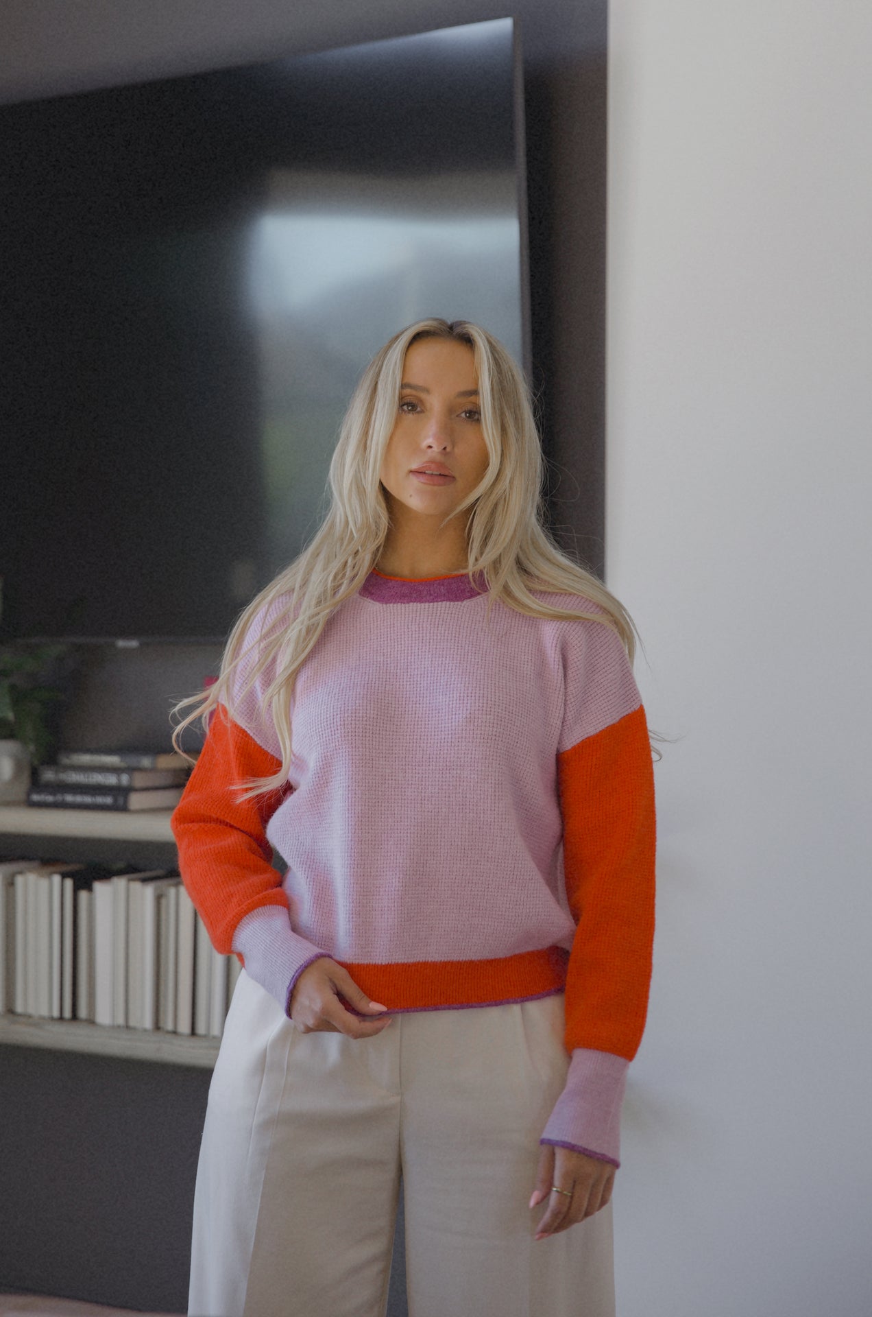 purple and red color block knit sweater