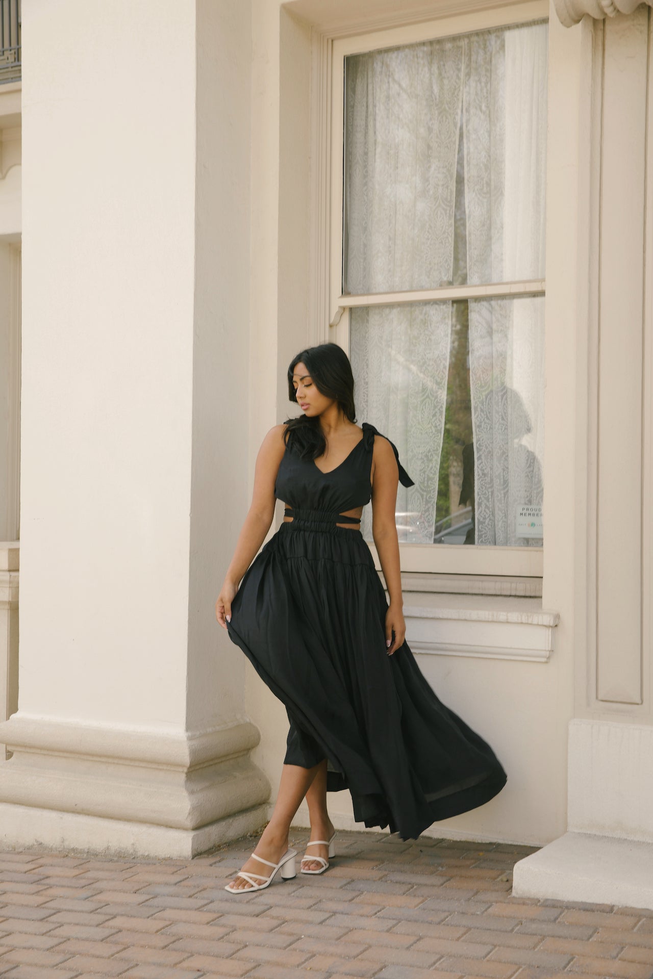 black cut out maxi dress with an open back