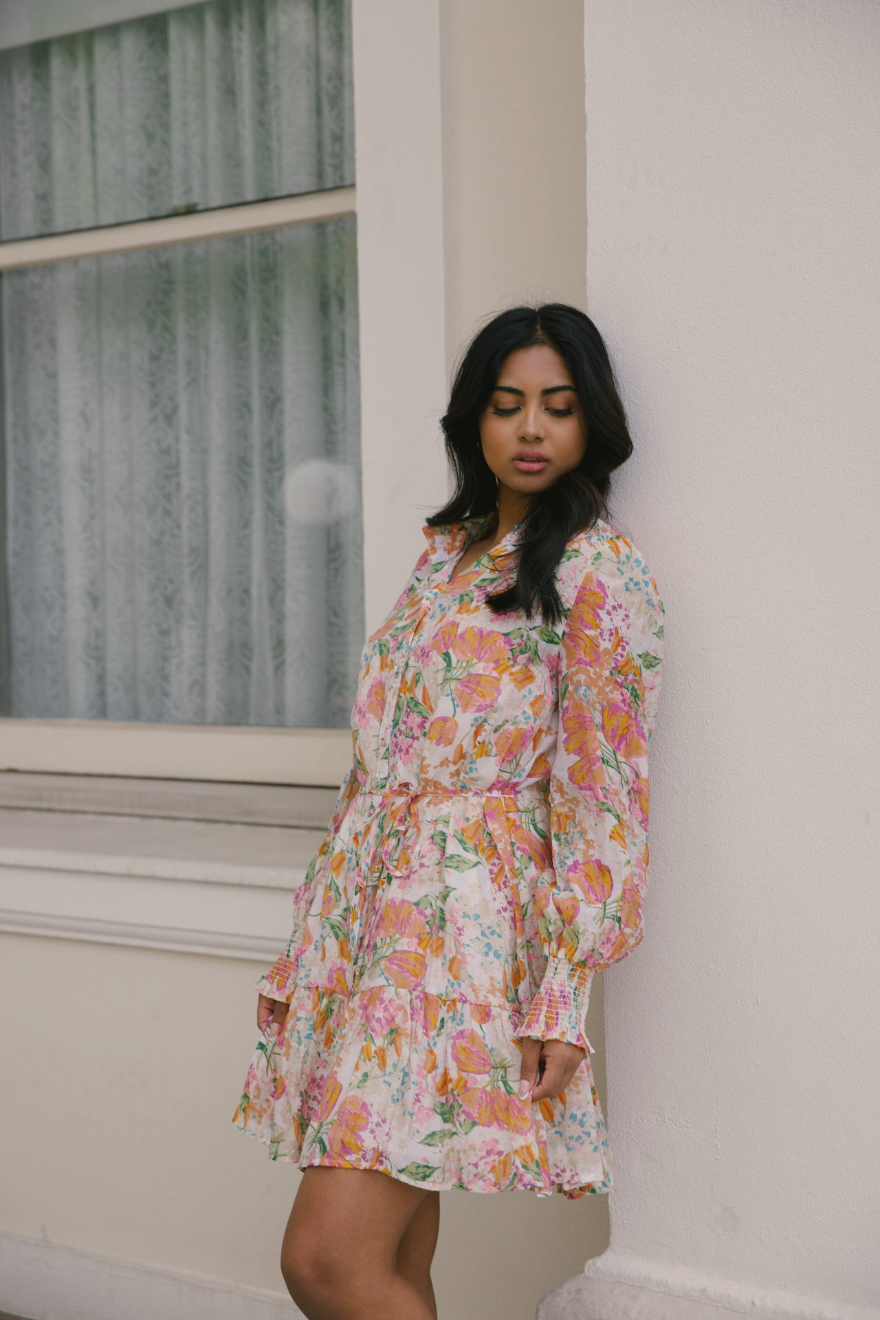 beige with orange floral mini dress with long sleeves and belted