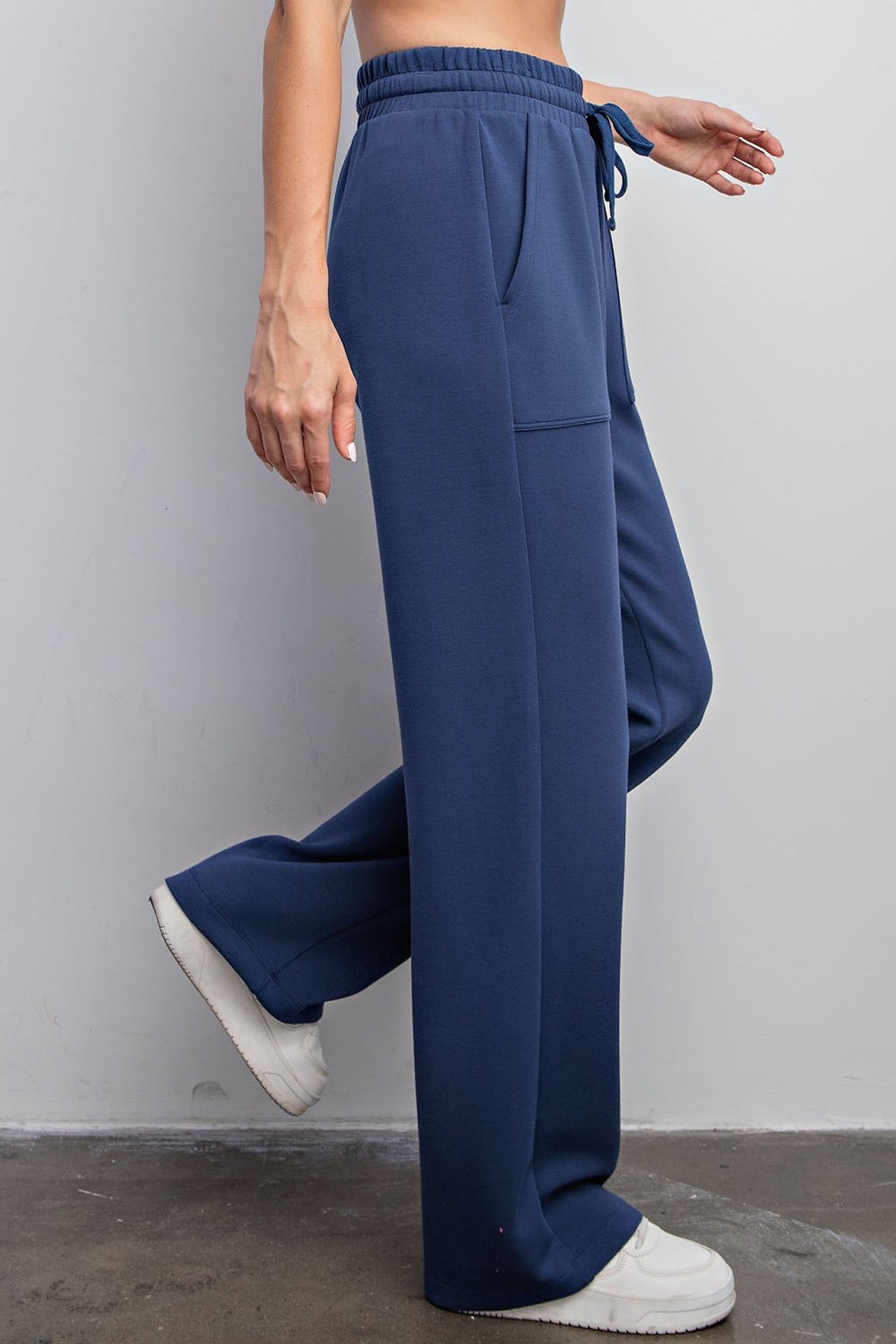 blue modal poly span sweatpants with pockets and an elastic waistband