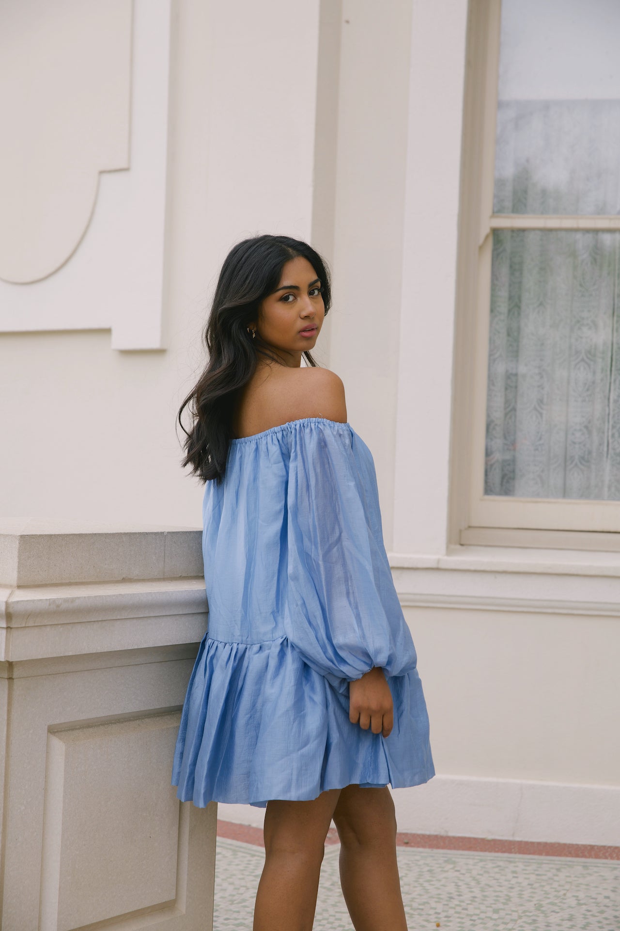 blue off the shoulder loose mini dress with puffy long sleeves and tiered skirt