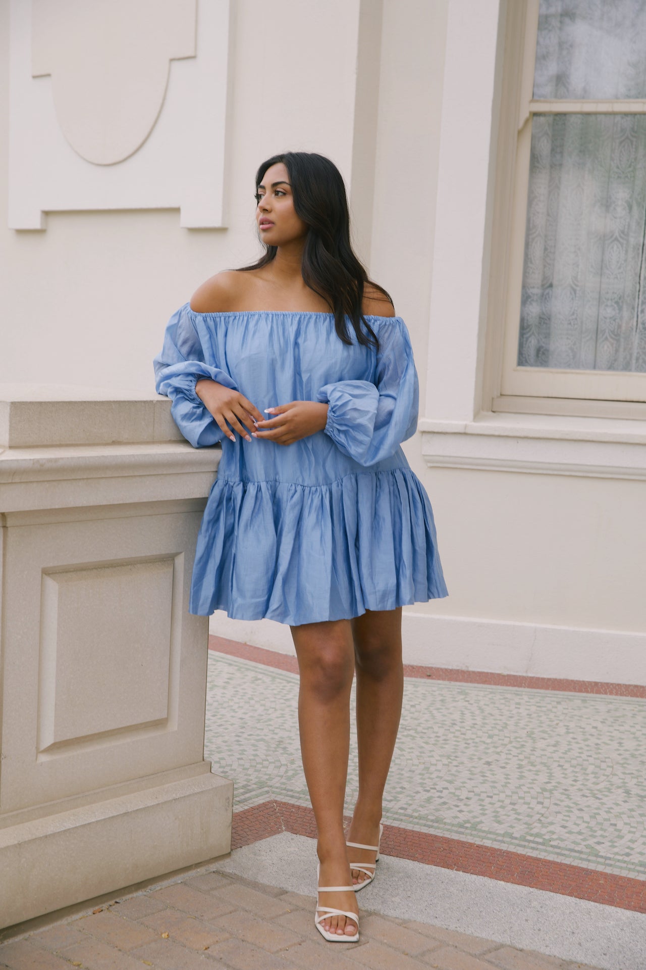 blue off the shoulder loose mini dress with puffy long sleeves and tiered skirt