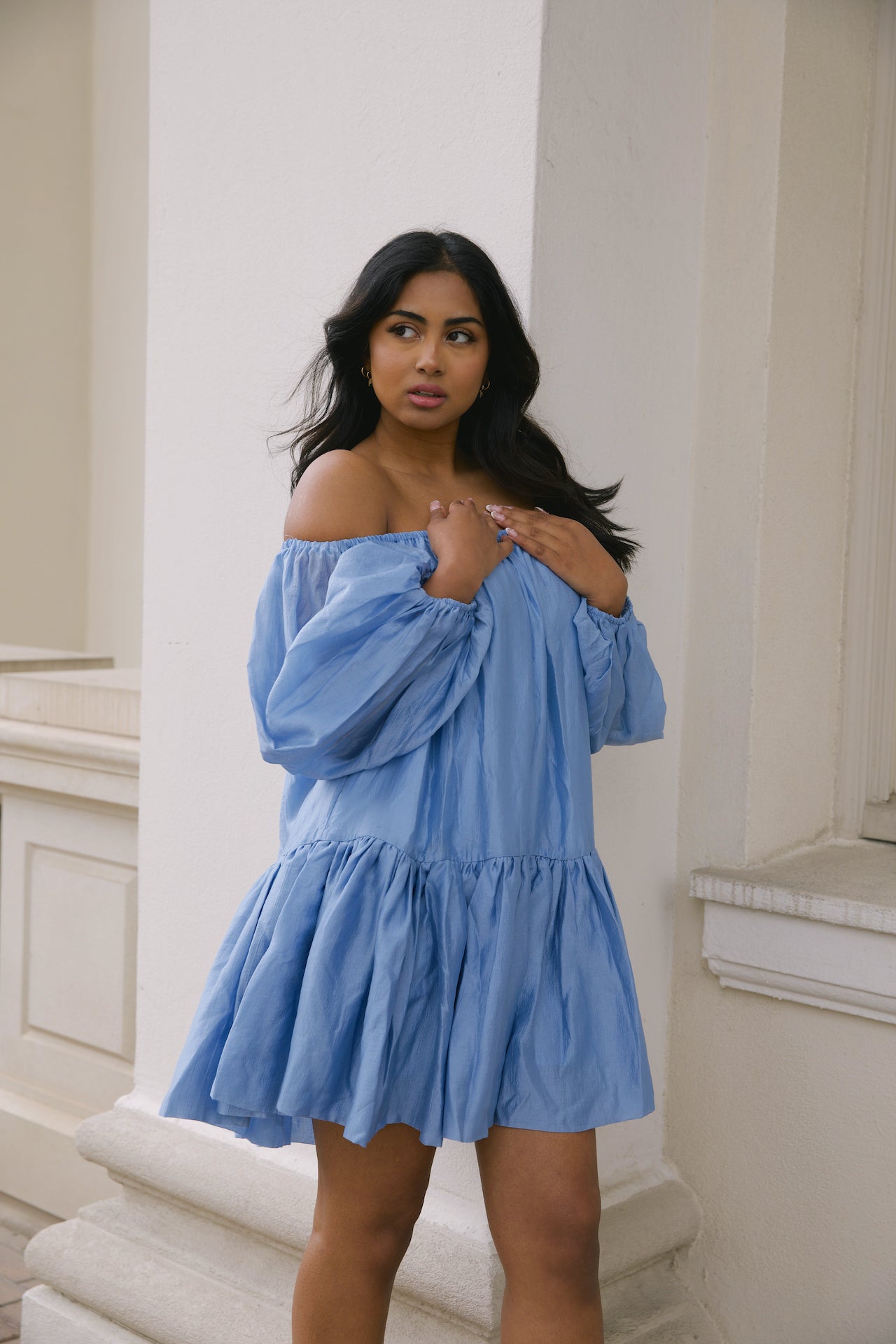 blue off the shoulder loose mini dress with puffy long sleeves and tiered skirt