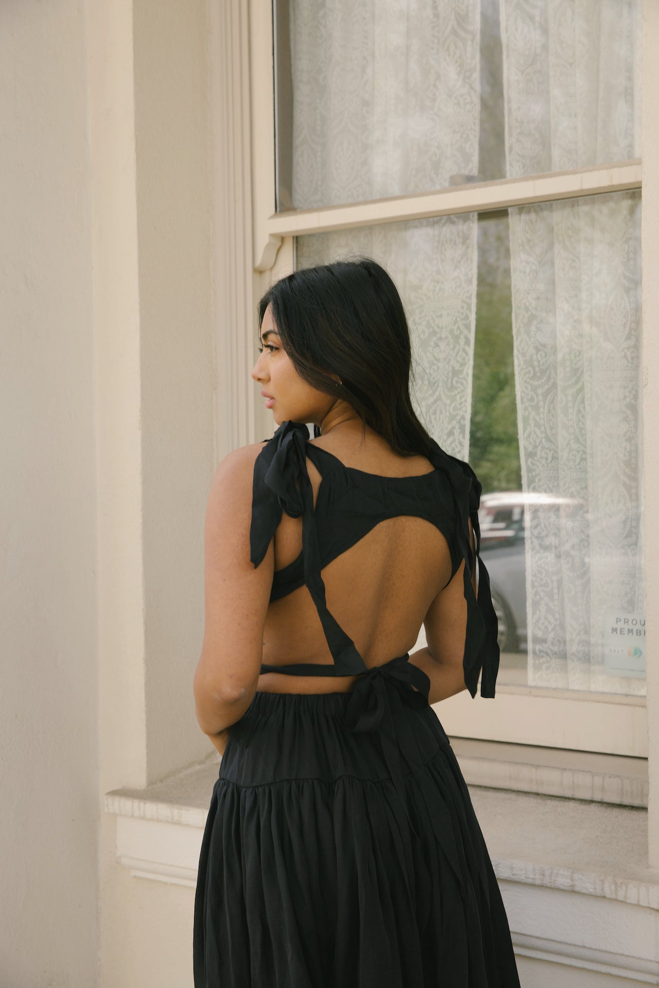 black cut out maxi dress with an open back