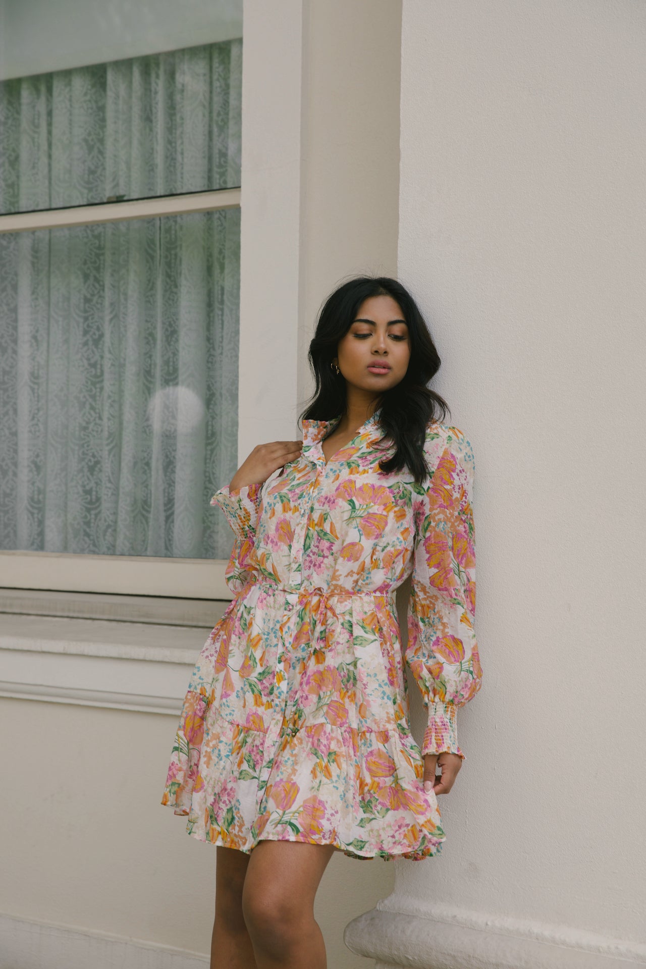 beige with orange floral mini dress with long sleeves and belted