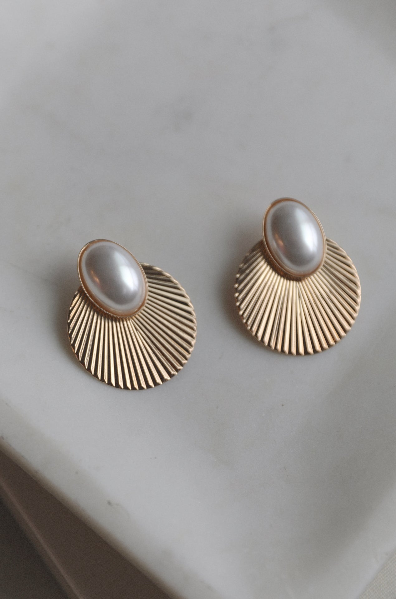gold seashell earrings with pearl