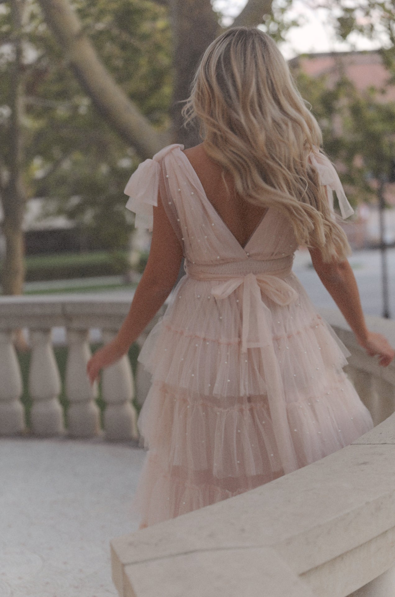 pink tiered tulle maxi dress gown with pearl embellishment