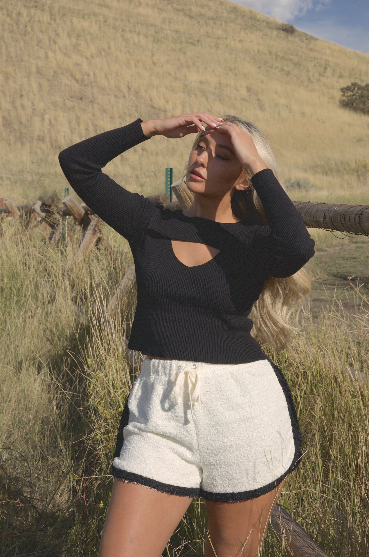 black cut out sweater top