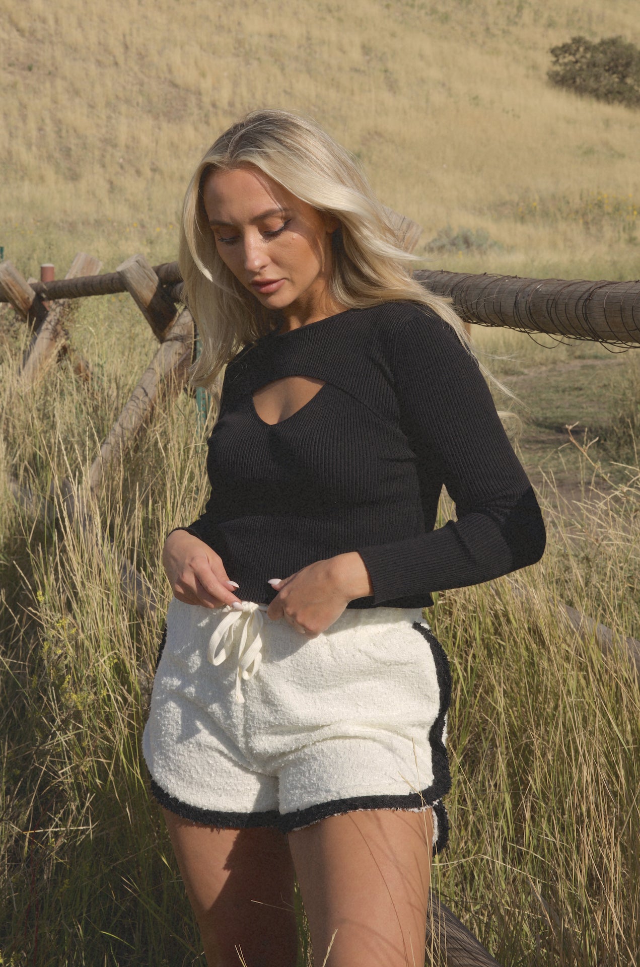 black cut out sweater top