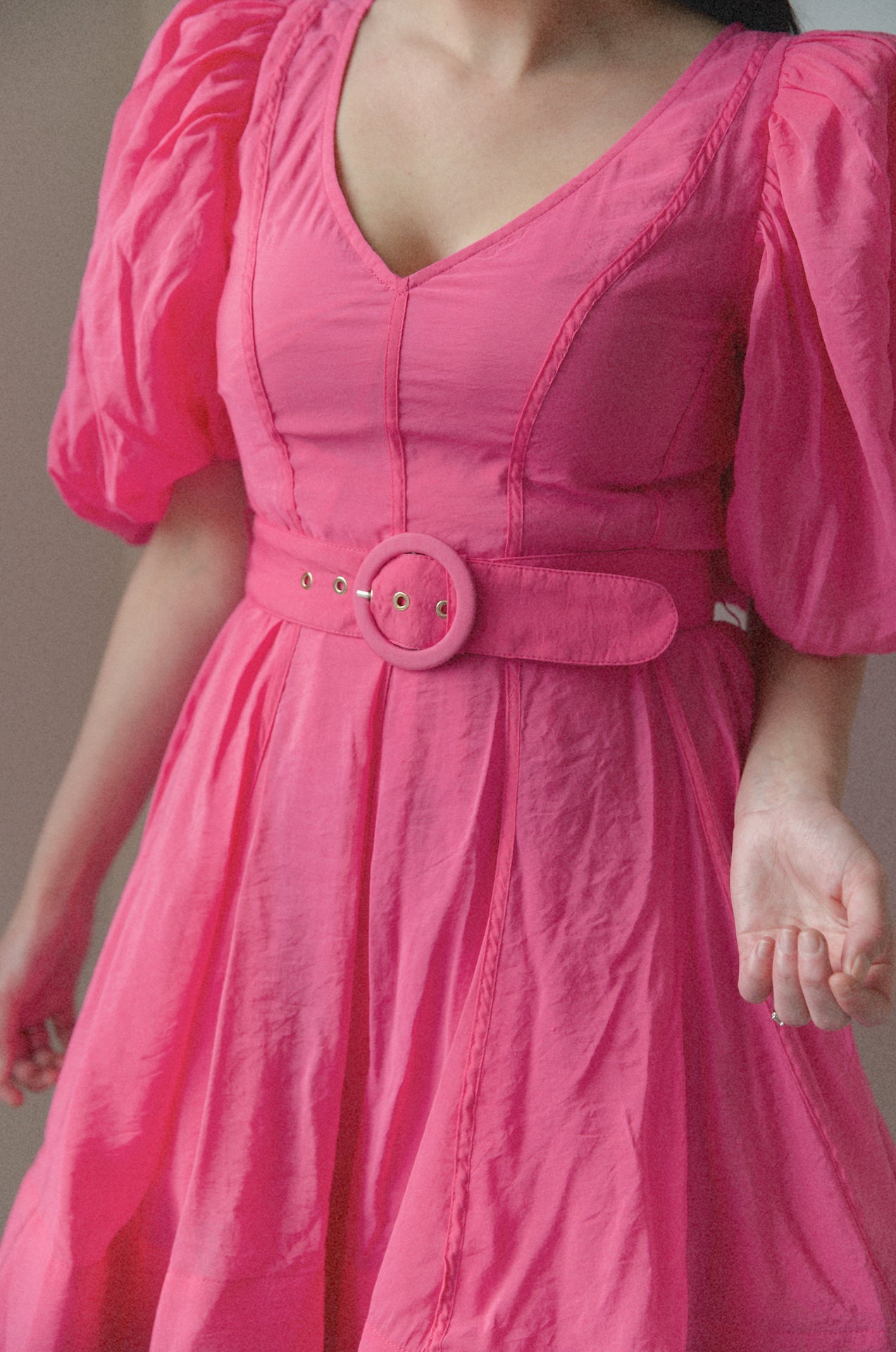 pink puff sleeve poplin babydoll mini dress with a belt