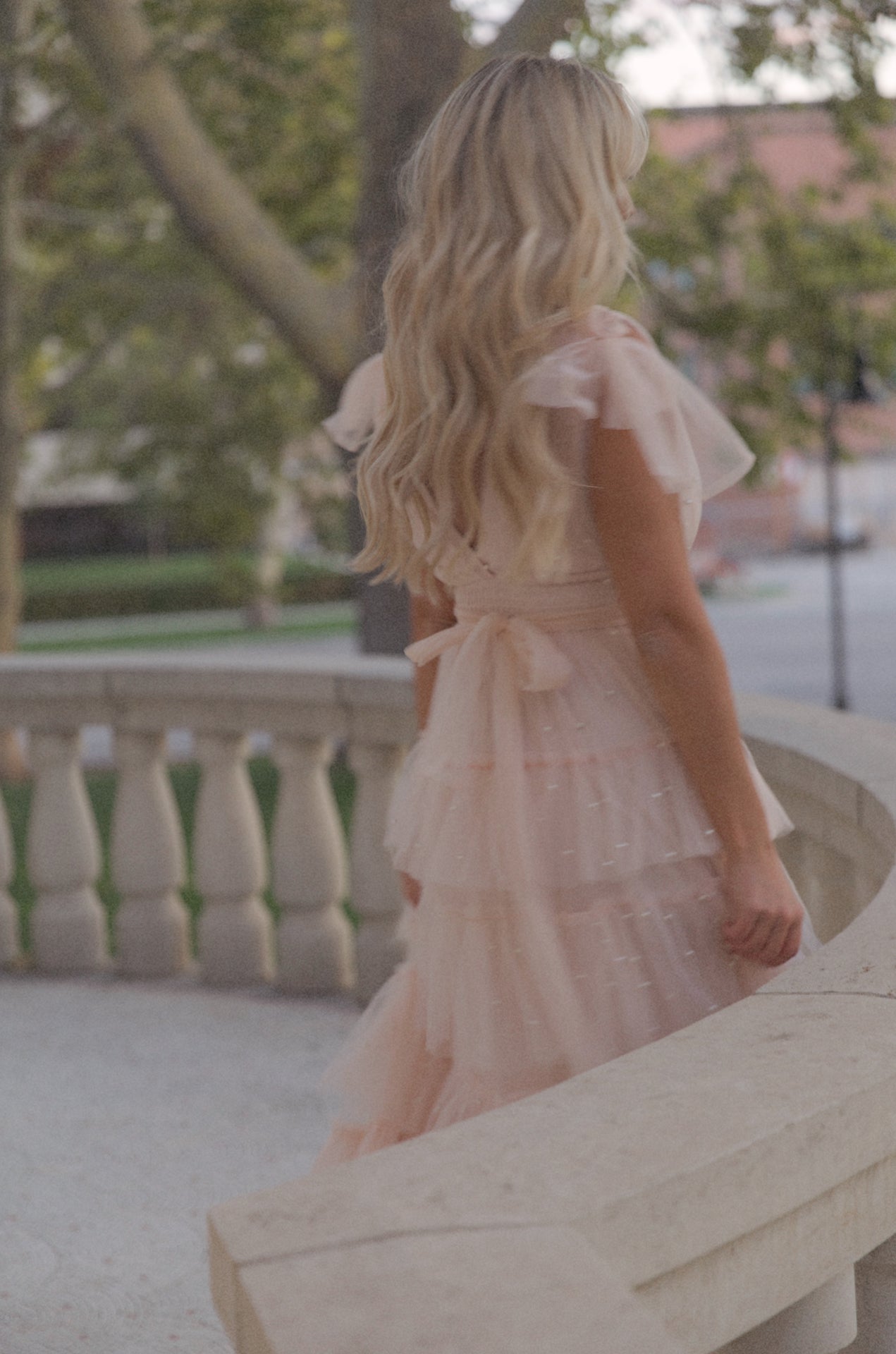 pink tiered tulle maxi dress gown with pearl embellishment