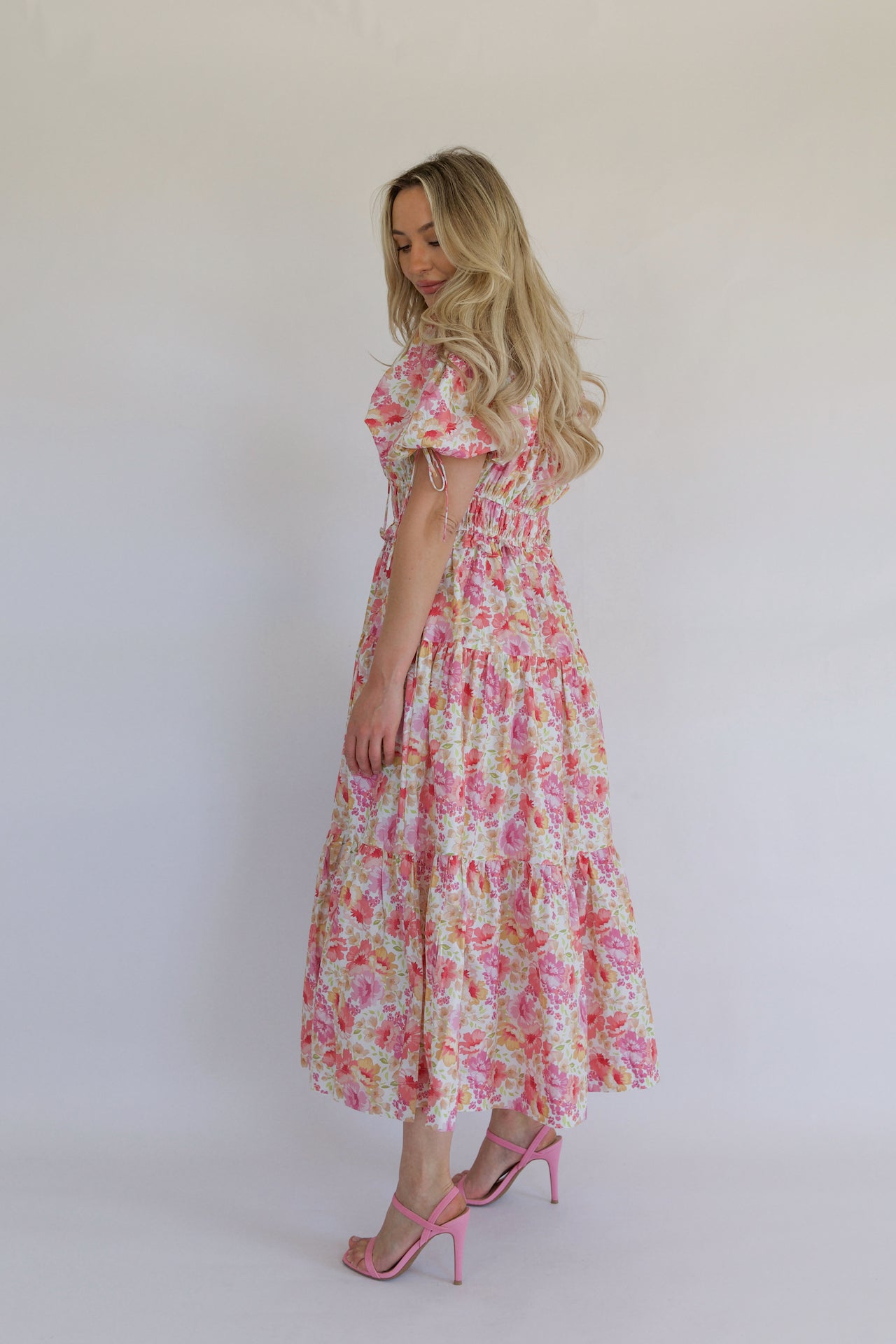 pink floral tiered maxi dress with pockets and puff sleeves