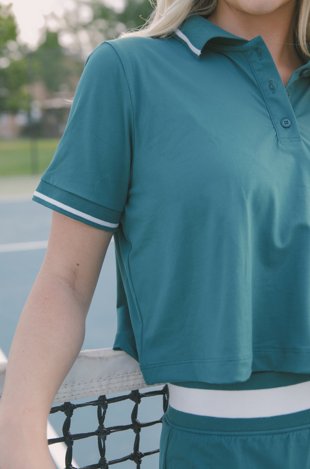 green cropped polo shirt