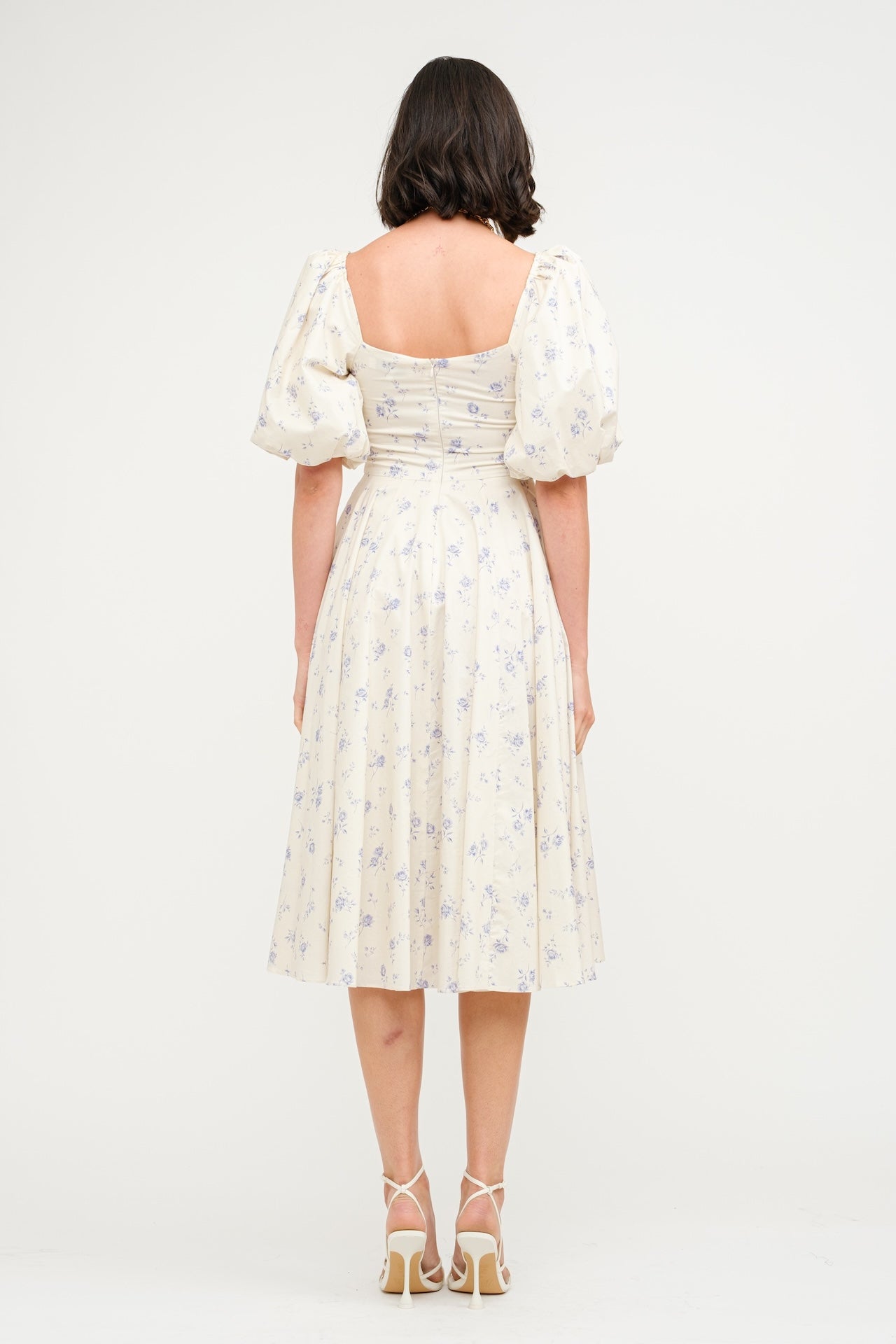 cream and blue floral midi dress with puff sleeves and square neckline